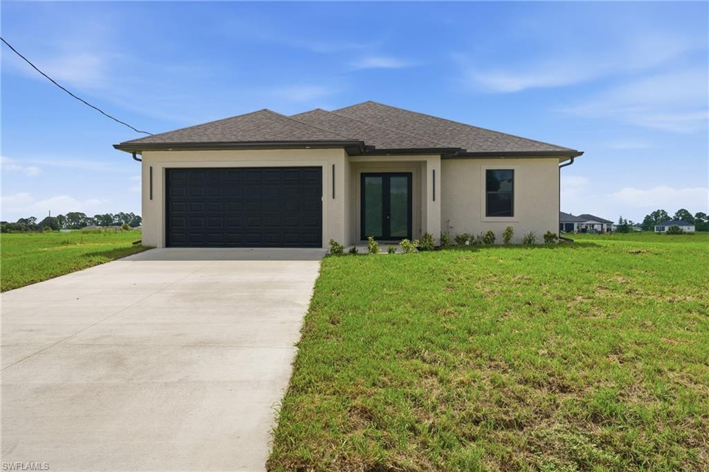Welcome home to this beautiful 3-bedroom, 2-bathroom residence offering 1,814 square feet of comfortable living space in a peaceful cul-de-sac setting. Situated on an oversized lot, this property provides the perfect combination of privacy, space, and opportunity.

One of the home's standout features is its desirable location backing up to a green space, creating a private backyard retreat with no immediate rear neighbors. Whether you're dreaming of a custom pool, outdoor kitchen, fire pit, garden, or entertaining area, there's plenty of room to design the outdoor oasis you've always wanted.

Inside, you'll find a spacious and functional layout designed for everyday living and gathering with family and friends. The generous lot size and tranquil surroundings make this property ideal for those seeking extra space without sacrificing convenience.

Don't miss your chance to own a home that offers privacy, room to grow, and endless possibilities in beautiful LaBelle. Schedule your private showing today!

***PICTURES ARE OF LIKE MODEL, NOT EXACT HOME***