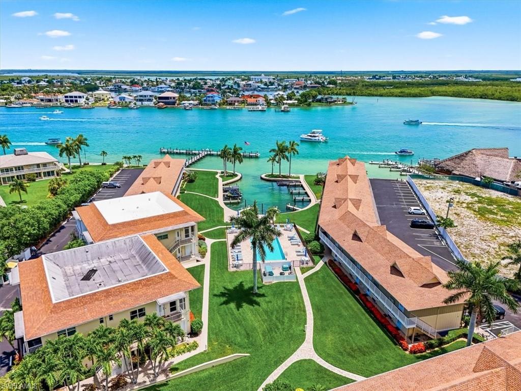 Discover the laid-back island lifestyle in this charming 1-bedroom, 1-bath condominium ideally located in the heart of Olde Marco. Just a short stroll to Marco Island's iconic Snook Inn, you'll enjoy waterfront dining, fresh seafood, and live entertainment right at your doorstep. Spend your evenings exploring The Shops of Olde Marco, where boutique shopping, local restaurants, and live music create the perfect island atmosphere. Whether you're looking for a seasonal getaway, investment opportunity, or full-time island retreat, this cozy residence offers the ideal blend of comfort and convenience. Enjoy easy access to marinas, boating, fishing, and some of Southwest Florida's most beautiful beaches, all just minutes away. Experience the relaxed charm, vibrant waterfront lifestyle, and tropical beauty that make Marco Island one of Florida's most sought-after destinations.