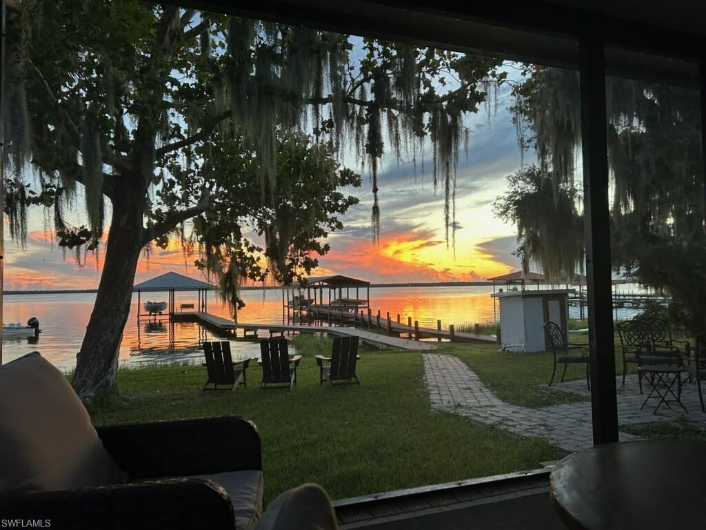 Come check out Serenity Cottage on Lake June. Beachfront and lakefront, this location has a walkout beach for little ones to play. This 2 bedroom, 2 bath home has been recently renovated. Relax on the swing on the end of the covered dock with boat house and lift. New composite decking. Expansive screened in porch area for outside dining and sunset watching in the shade. Lake June is a clear sandy bottom full recreation lake. The cottage is being sold fully furnished. Detached garage with plumbing for full bath. Store your toys or convert to a bunkhouse for the grandkids. Better check it out before it's gone!