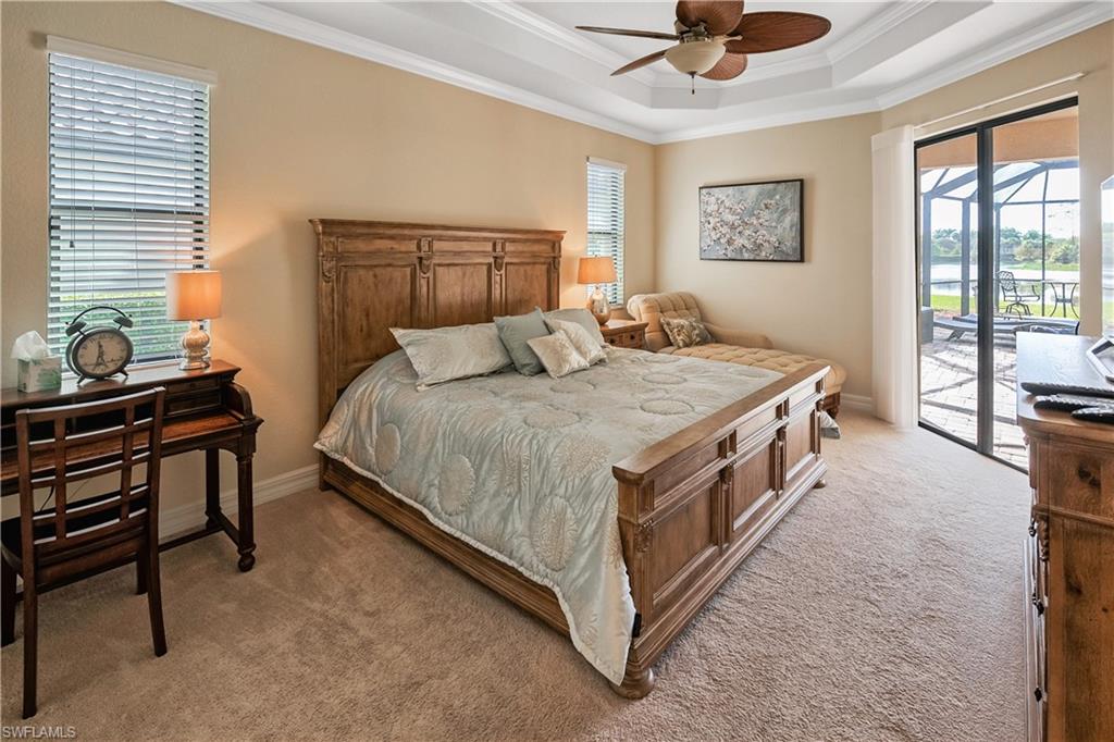 Available for 2026 off season! Booked for January - March 2027. Enjoy breathtaking lake views from this beautifully maintained Victoria Model home in Treviso Bay. Featuring 2 bedrooms, 2.5 baths, and a den converted into a third sleeping area. The primary suite offers a king-size bed, the guest bedroom features a queen-size bed, and the den includes two full-size beds, providing comfortable accommodations for family and guests. The private screened lanai is designed for relaxation and entertaining, complete with a heated pool, spa, and outdoor kitchen overlooking the water. A transferable TPC Golf Membership is available, allowing tenants to enjoy championship golf for a nominal cart fee, along with access to Treviso Bay's outstanding amenities, including tennis, pickleball, bocce, basketball, a state-of-the-art fitness center, full-service spa and salon, two on-site restaurants, and a resort-style lagoon pool.