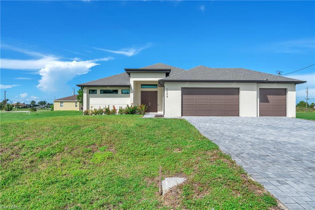 Beautiful newer construction home built in 2023, located in NW Cape Coral! This spacious home features 3 bedrooms, 3.5 bathrooms, and 2,048 sq. ft. of living space. Enjoy a modern and comfortable layout with plenty of room and privacy. Conveniently located near shopping, dining, and everyday essentials. A great opportunity to enjoy a newer home in a growing area of Cape Coral. Schedule your showing today!