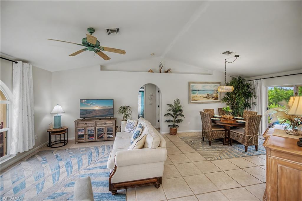 Discover the charm of Island living in this beautifully maintained 3-bedroom, 2-bath home nestled in the heart of Bokeelia! Offering 1,460 square feet of comfortable living space, 2 car garage, and recent updates, this move-in-ready home combines peace of mind with the relaxed Florida lifestyle you've been dreaming of.

The backyard is a gardener's delight, featuring beautifully landscaped grounds with lots of mature fruit trees, 6 banana trees (3 different types), 1 mango, 3 papaya, 1 lemon, 2 sea grapes, 1 shampoo ginger, and a sugar cane, thriving herb gardens and colorful tropical plantings that create peaceful setting to relax, entertain or simply enjoy Florida's natural beauty. There is a lush perimeter of mature shrubs, landscaping that provides natural privacy and enhances the homes' tranquil atmosphere.
Inside you'll appreciate the comfortable floor plan and the peace of mind that comes with major improvements, NEW ROOF (2023) ALL NEW PLUMBING THROUGHOUT THE HOME (2025), NEW WATER HEATER (2025), Even more reassuring the home has never flooded during any of the recent hurricanes. 

Conveniently located within walking distance of the community pool, pickleball courts, shopping, the local museum, and several popular restaurants, you'll love having everyday amenities just minutes from your front door. A short drive brings you to the public boat ramp, offering easy access to world-class fishing, boating, kayaking and all the waters surrounding beautiful Pine Island.
Built in 1994 and lovingly care for this home offers the perfect blend of comfort, convenience and the laid-back charm that makes Bokeelia such a desirable place to call home. Whether you're looking for a full-time residence, a seasonal retreat, or an investment opportunity this property is ready to welcome its next owner.