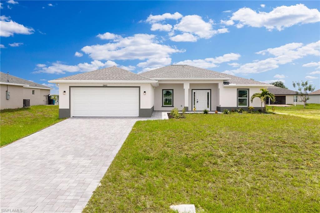 This brand new construction house is ready for you to make it a home. The finishing touches with this beauty start outside with the paver driveway with pavers that leads you all the way to the front door. Amazing open concept design with tile floor throughout, no mismatching floors here. The kitchen has all new stainless steel appliances and quartz countertops to go along with the perfectly blended cupboards. The long kitchen island gives you plenty of counter space to utilize. Convenience galore with having not just one, but two bedrooms that have their own private bathroom. 

No need to deal with shutters as this home comes with impact windows and doors, plus it is NOT IN A FLOOD ZONE. Homeowners insurance is typically much cheaper too with impact windows and doors, especially with no flood insurance being required, so be sure to mention that to your insurance provider! You even have a rear covered lanai space to relax on. Come experience the convenience stress free life that is a new contruction home.