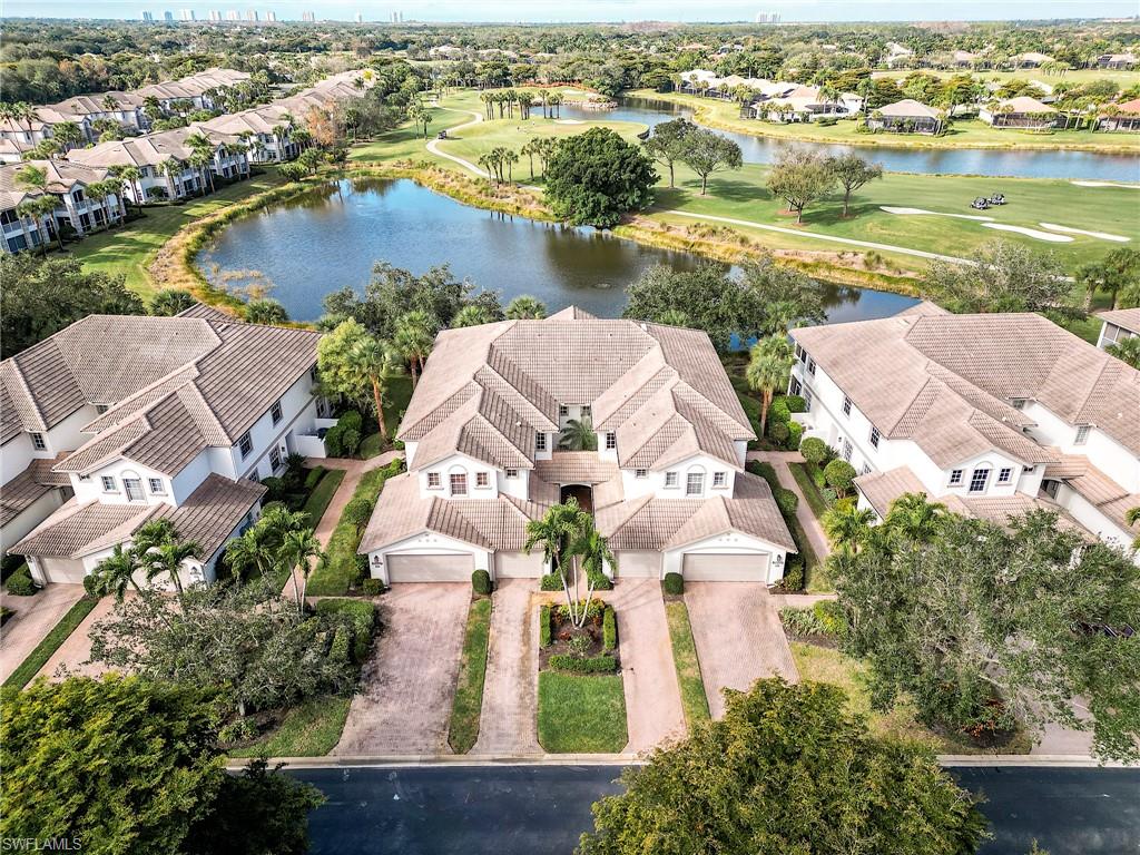 Step right into an effortless lifestyle with this turnkey furnished condo, offering the perfect combination of convenience and scenery. Positioned with sought-after Western exposure, you will enjoy gorgeous nightly sunsets along with sweeping views of the lake and the 6th hole of the Shadow Wood North Course.
The interior is bright and spacious, highlighted by vaulted ceilings and tray ceilings with crown molding. The kitchen features stainless steel appliances, while plantation shutters and custom window treatments provide excellent light control and privacy throughout. The updated master bathroom adds a fresh, modern touch to the owner's suite.
This floor plan is exceptionally practical, featuring a versatile 3rd bedroom/media room that is large enough to comfortably accommodate both a bed and a living area—ideal for guests or a home office.
Peace of mind and easy maintenance are front and center here. The home is equipped with electric hurricane shutters, making coming and going prep quick and simple. You are also just steps away from the community pool, spa, and social building, making it easy to relax without the hassle of maintenance. Whether for a seasonal retreat or a permanent residence, this unit offers true move-in readiness with a view you won't want to miss. The Shadow Wood Club has been completely renovated, providing world-class amenities, and there is no current assessment for the community. Residents enjoy optional golf and country club memberships, tennis, pickleball, fitness, and access to The Commons Club with a private beach club, spa, and dining. This home truly captures the essence of luxury Florida living—a peaceful retreat surrounded by nature and community, where every day feels like a getaway.