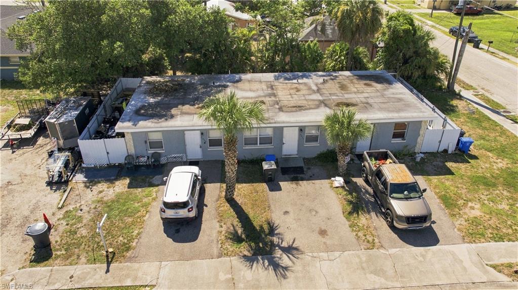Excellent investment opportunity in Fort Myers! This triplex features three 2-bedroom, 1-bath units with approximately 1,674 square feet of total living area. Each unit offers approximately 558 square feet with a functional layout, tile flooring, central electric A/C and heating, and in-residence laundry. The concrete block construction and three-unit configuration make this property an attractive addition to an investment portfolio. Conveniently located just minutes from Downtown Fort Myers, with easy access to shopping, dining, entertainment, employment centers, and major roadways. Whether you're looking to expand an existing rental portfolio or acquire a multi-family property with income-producing potential, this triplex offers versatility and opportunity in a convenient Fort Myers location.