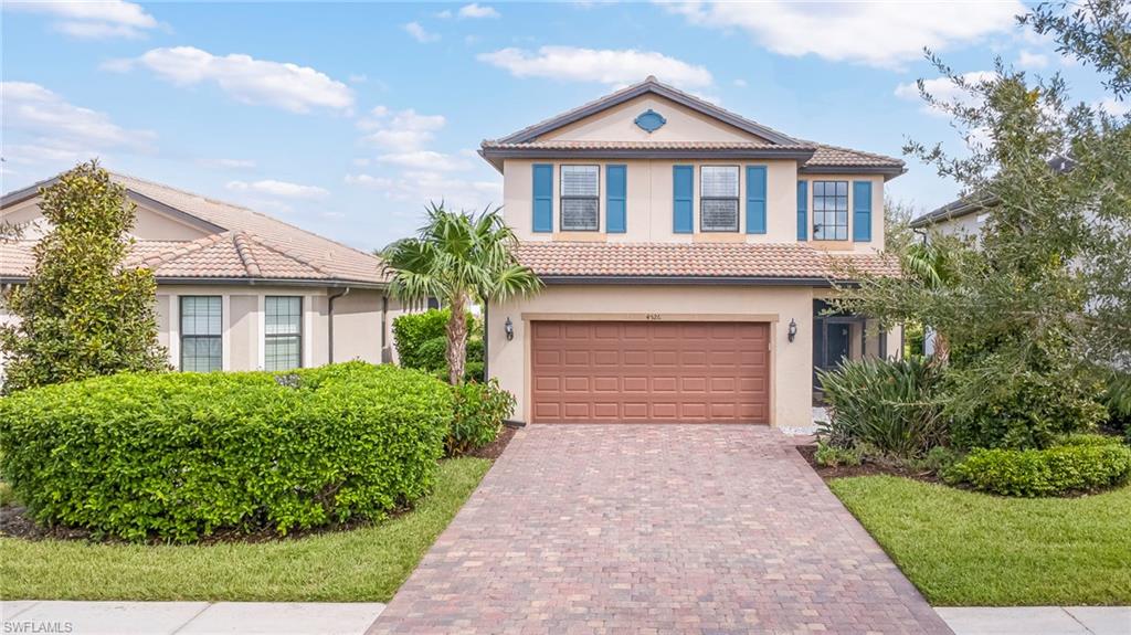 One or more photo(s) has been virtually staged, AI generated or rendered.  ***Seller offering $15,000 TOWARDS BUYER'S INTEREST RATE BUYDOWN & CLOSING COSTS!*** ROSARY LAKE just across the street, GORGEOUS SUNSETS outside your front door, and VIEWS OF AVE MARIA CHURCH from the upstairs secondary bedrooms—discover a scenic setting CLOSE TO THE HEART OF TOWN at 4526 Battlecreek Way! Built in 2018, this METICULOUSLY MAINTAINED STARBOARD floor plan offers 3 BR+LOFT/2 BA/ 2-CAR GARAGE, and 1,853 SQUARE FEET of living space.

TILE FLOORING DOWNSTAIRS complements a bright kitchen featuring UPGRADED WHITE CABINETRY and GRANITE COUNTERTOPS. A SEPARATE LAUNDRY ROOM sits conveniently off the kitchen, while the upstairs loft provides additional space for a home office, hobbies, or a second living area. PLANTATION SHUTTERS on every window add a polished finish, and IMPACT WINDOWS AND DOORS provide storm protection.

Enjoy the outdoors from the SCREENED-IN LANAI overlooking a FENCED BACKYARD, with a hedge separating the yard from the homes behind it. Across the street, Rosary Lake offers an approximately 2-MILE TRAIL LOOP and OPPORTUNITIES FOR FISHING. The front-facing upstairs secondary bedrooms capture VIEWS OF AVE MARIA CHURCH, while the home's location places AVE MARIA CATHOLIC ACADEMY, AVE MARIA ELEBENTARY, AND THE TOWN CENTER CLOSE BY.

Enjoy ACCESS TO THE GYM IN THE TOWN CENTER, along with ACCESS TO THE AVE MARIA WATER PARK FOR A SMALL ADDITIONAL FEE. Water park amenities include LAP LANES, 2 WATERSLIDES, WATER POLO, a KIDDIE POOL, and more. From lakeside outings to sunset views, this home brings together thoughtfully maintained interiors and convenient access to Ave Maria's community amenities.

Ave Maria: where community meets paradise.