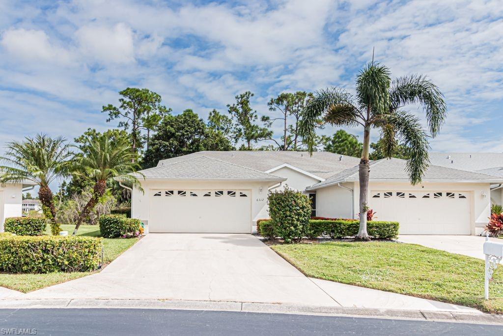 Coastal-inspired 3 Bedroom, 2 Bath Villa in Shadowood Villas! This beautifully maintained 3BR/2BA attached villa with a 2-car garage offers over 1,350 sq. ft. of inviting living space and low HOA fees of just $500/quarter. Best of all, it is NOT in a flood zone, giving you added peace of mind. The open split-bedroom floor plan features a bright coastal-style kitchen with white cabinetry, granite countertops, GE appliances, and a cozy breakfast nook with bar seating—perfect for casual dining. The versatile second bedroom or den with a window and closet makes an ideal space for a home office or guest room. Enjoy peaceful mornings or relaxing evenings on the extended screened lanai with northwest exposure and serene preserve views, complete with accordion storm protection and shutters on all windows. Brand new roof, gutters, and downspouts were completed on 10/27/2025, and a transferable HomeTech warranty provides coverage for appliances and A/C. Residents love the heated community pool just steps away and the unbeatable location—only 9 miles from Naples’ white sandy beaches, Downtown 5th Avenue shopping and dining, boating, golf, pickleball parks, and more. Shadowood Villas offers the perfect blend of Florida style, comfort, and value.