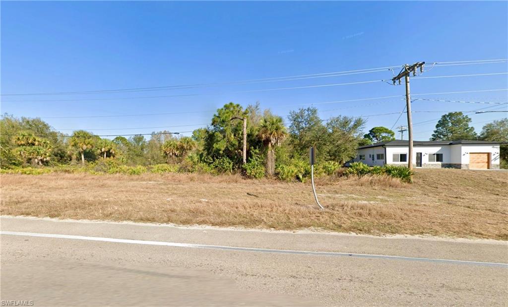 This is an awesome opportunity to pick up a great lot at a great price in the SE area of Lehigh! Power pole right out front for easier connection and cost savings. In a growing area for new construction only minutes from East Lee High School, Mirror Lakes Elementary, the local fire station, family dollar and plenty of other conveniences right up the road! Purchase and hold for investment or build a beautiful home in a great location. This is a steal of a deal so call today to buy it before it goes away!