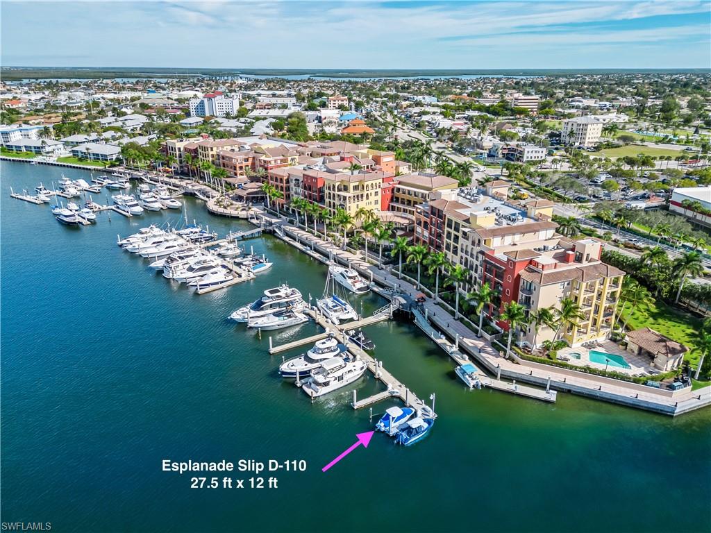 Welcome to your new homebase for your boat at the Esplanade on Smokehouse Bay where sunsets abound & there's always something to do just steps from your slip on the gorgeous promenade.  This easy access slip on the end of D-dock is 25 ft with a max LOA of 27.5 ft & beam of 12 ft.  You can plug your boat into the 30 amp pedestal, get a pump out, have Wifi, water & owner's access to the captain's lounge complete with restrooms, showers, laundry & common area with TV when you need it.  The marina has a deepwater basin composed of Bellingham concrete floating docks & is located centrally on the island close to all your provisional needs.  Just around the corner under the bridge, you can pull your boat right up to Winn Dixie's dock & grab everything you need for a day of fishing or hanging on one of our pristine local beaches.  Don't miss out on a great opportunity to own at the prestigious Esplanade Marina of Marco Island!