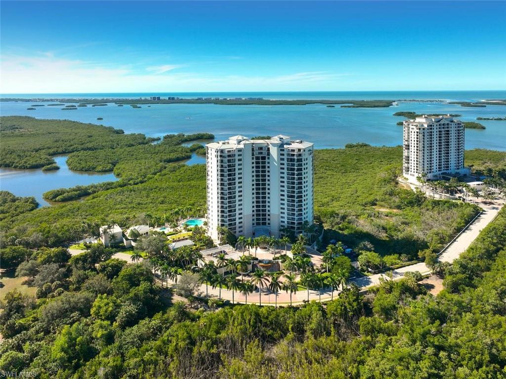 Perched on the 18th floor of Palermo, this beautifully updated residence captures expansive south-southwestern views across Estero Bay, the Gulf, and surrounding preserves. Walls of glass fill the home with natural light while showcasing the remarkable scenery from the main living areas and generous screened lanai —the perfect setting for outdoor dining, relaxing, and taking in Southwest Florida sunsets. Offering 3 bedrooms, 3.5 full baths, and more than 3,240 square feet of living space, the thoughtfully designed floor plan blends comfort with understated coastal elegance. The updated kitchen features new exotic granite countertops, all-new Wolf appliances, and a new Sub-Zero refrigerator, opening seamlessly to spacious living and dining areas designed to keep the views at center stage. Updated guest baths, all new window coverings and California closets in all bedrooms adds to the residence’s fresh, refined appeal. A private elevator entry provides an impressive sense of arrival, while abundant storage, automatic storm shutters, and two parking spaces within the secured garage add everyday convenience. Palermo offers an intimate collection of amenities, including two guest suites, a fitness center, resort-style pool and spa, and lobby privacy officer. Residents of The Colony also enjoy access to The Bay Club for waterfront dining, a private 34-acre island beach park, kayak and canoe park, tennis, pickleball, and more. Optional golf and sports memberships are available at The Colony Golf Club. An exceptional opportunity to enjoy elevated high-rise living and spectacular views from the 18th floor.