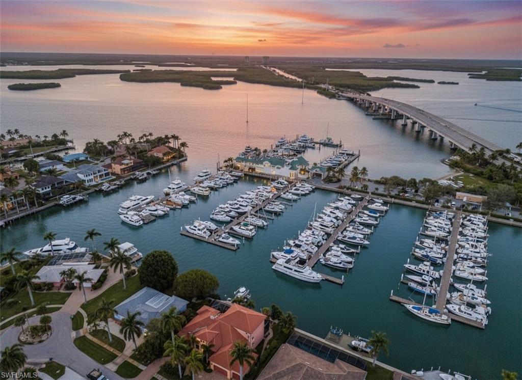 Welcome to the Marco Island Marina, where this 40' deeded boat slip combines a premier island location, deep protected water and exceptionally convenient access to the Gulf of Mexico. Ideally suited for boats 42' and under, this slip is also an excellent candidate for a center-console lift setup and can accommodate a vessel up to 44' LOA with a maximum 15'6'' beam. Positioned on the east side of D-Dock, just 5 slips down from the parking lot, you'll appreciate how easy it is to load coolers, fishing gear, groceries and everything you need for a day on the water. Slip out of the protected yacht basin & head to one of our Gulf beaches in just minutes. Run offshore for a day of fishing, cruise the Marco River, or point the bow south toward Goodland, Stan's and the Florida Keys. The marina features premium Bellingham concrete floating docks, and the slip is equipped with 30 & 50 AMP shore power plus a convenient dockside storage box. When you're back at the dock, enjoy a full complement of marina amenities including a pool, barbecue area, ice, showers, restrooms, laundry, conference room, mailboxes, dock carts, ample parking and an onsite dock master, along with 24-hour surveillance and security cameras. As part of this 120-slip owners' marina, owners have the flexibility to enjoy their slip personally while also having the potential to rent through marina management or participate in the transient rental pool when the slip isn't being used. Add in live-aboard privileges, fuel-truck accessibility, nearby island provisions and Yacht Club of the Americas benefits, with the beautiful Marco Island Yacht Club onsite, and you have far more than a place to dock your boat--you have a home base for the SWFL boating lifestyle. Quarterly Fees: $739.15 = $2,956.60 annual total. As of September 1st, there is a one time buyer contribution fee of 1.5 percent of the purchase price due at closing. Electricity is metered & paid by the slip owner. $50/month flat fee for Water/Sewer & WiFi. Slip taxes are billed from the County to each individual owner.
