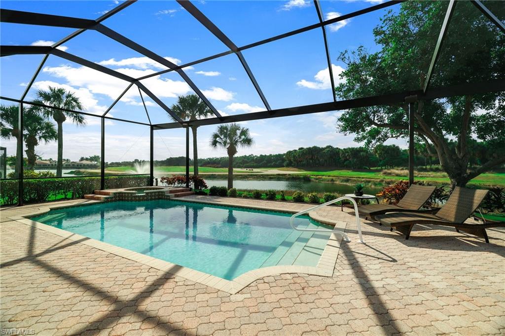 Click video link for more up-close details. Move-in ready luxury in an exclusive gated community. This property features new hardwood flooring and updated baseboards throughout the entire home. New roof in 2024 gives you peace of mind and long-term value for years to come. Enjoy sweeping golf course views and coveted southwest exposure from the oversized pool and lanai, completed with a new pool cage and frameless screening. Thoughtfully upgraded with added custom guest bathroom, dual laundry areas, and natural gas service. Gas is also stubbed to the house. Professionally decorated and impeccably maintained, this home is situated on an oversized cul-de-sac lot offering exceptional privacy. Truly move-in ready be prepared to be impressed. With 24/7 security, lush landscaping and exclusive access to neighborhood amenities, this home offers the perfect blend of privacy, luxury, and convenience. Miromar features 700 acres of fresh-water lakes, with boating, fishing, swimming, water skiing, 3 miles of sand beaches, Caribbean style beach grill, country club, resort style pool, full-service spa, fitness center, golf, tennis, pickleball and many other luxurious amenities.