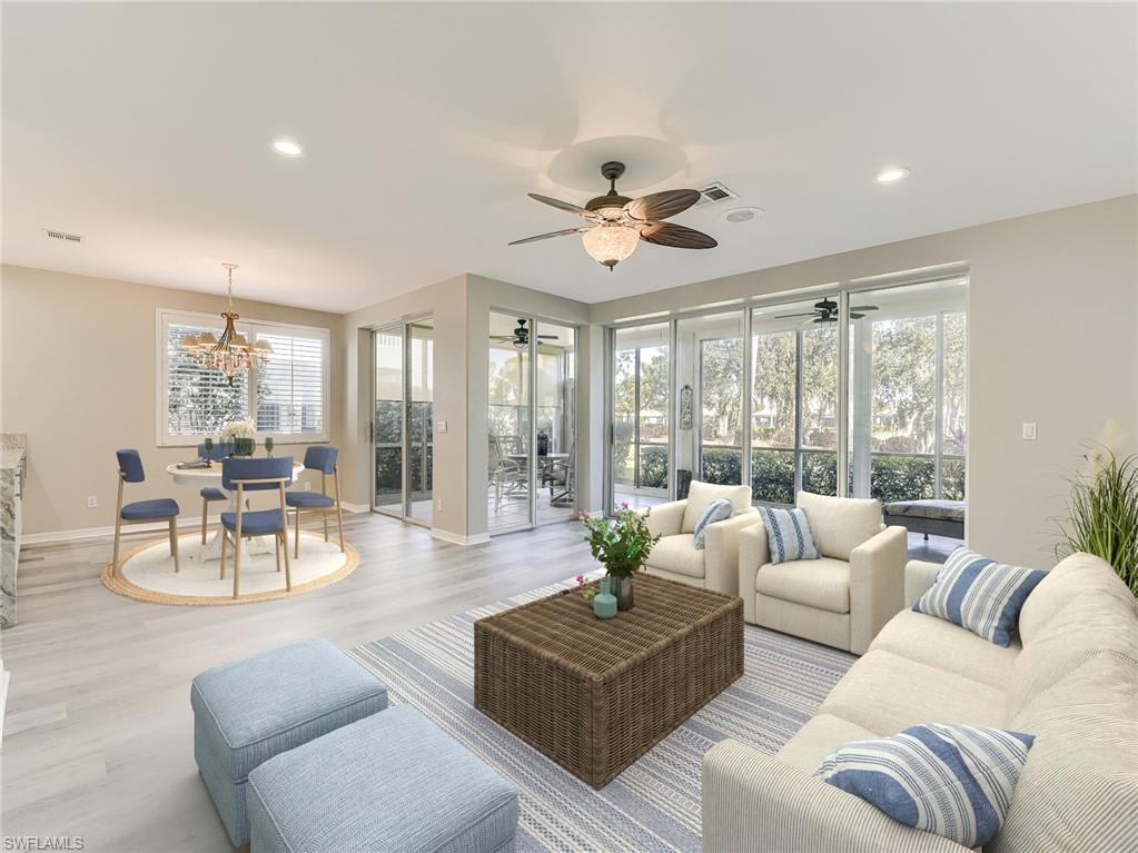 One or more photo(s) has been virtually staged, AI generated or rendered.  Move-In Ready First-Floor Condo with Golf Course Views!  Start enjoying the Southwest Florida lifestyle this winter in this beautifully refreshed condo in The Vines at Estero Country Club. New laminate flooring and fresh paint throughout create a clean, inviting feel, while the open living area and desirable split-bedroom floor plan offer comfort and privacy. The kitchen features abundant cabinetry and a stunning waterfall granite countertop, perfect for everyday living and entertaining. The spacious primary suite boasts two closets, including a walk-in. Step onto the enclosed lanai overlooking the par-3 8th hole at Estero Country Club. Plexiglass sliders allow you to enjoy the space year-round while extending your living area. A one-car garage plus dedicated golf cart space adds convenience, and private golf cart use on the course is permitted by the club. You’ll also love the location directly across from the neighborhood pool!

A social membership at Estero Country Club is required for all new owners. Golf memberships are available at an additional cost, with no waitlist for new owners.

The Vines is a hidden gem, conveniently located near RSW International Airport, three major shopping centers, and a variety of restaurants, with Bonita Beach and Fort Myers Beach approximately 20 minutes away. Why wait? Buy now and be ready to enjoy the upcoming winter season in beautiful Southwest Florida!
