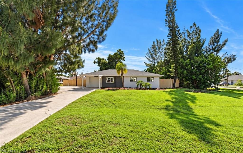 One or more photo(s) has been virtually staged, AI generated or rendered.  Welcome to San Carlos Park, one of Fort Myers' most convenient and sought-after neighborhoods with no HOA and a location that's hard to beat. This solid concrete block home offers 3 bedrooms, 1 bath, and luxury vinyl planks throughout, making for easy maintenance and a clean, modern look. Set on a BIG corner lot with plenty of room for a pool, boat, trailers, or all your toys, this property gives you space and freedom that's getting harder to find. The big items are already handled with a newer roof, city water, and the peace of mind of sitting outside a flood zone, NO FLOOD INSURANCE REQUIRED. Tucked between US 41 and I-75, you're just minutes from Three Oaks Park, FGCU, Coconut Point, Gulf Coast Town Center, RSW International Airport, and the beautiful beaches of Southwest Florida. Whether you're a first-time buyer, downsizing, or looking for a smart investment in a high-demand rental corridor, this one delivers. Schedule your showing today!