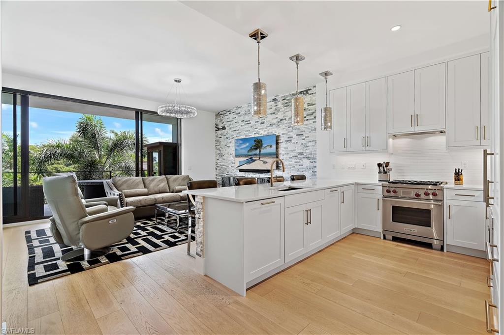 Leased from January 25 - March 25, 2027. This boutique condo is in an exclusive 22 unit building in the heart of Naples. The building offers plenty of privacy, while just steps from 5th Avenue shopping and dining and mere blocks from the beach — truly the best of both worlds. This 2 bedroom + den unit was designed with clean lines and contemporary touches, high end finishes, and airy, light-filled rooms with high ceilings. This unit exudes sophisticated style, from the open living and dining space to the white gourmet kitchen with stainless appliances. The bedrooms are spacious and bright, and each bathroom is accented with beautiful white subway tile. Your terrace overlooks the sunny and green courtyard, with amenities that include a pool with cabanas and an outdoor patio with multiple grills. 850 Central is truly the epitome of luxury!