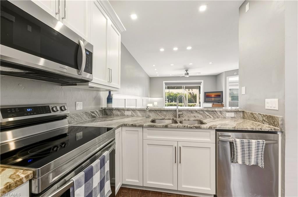 Experience the ultimate Florida waterfront lifestyle in this beautifully updated first-floor condo located in the peaceful community of Port of the Islands. This 2-bedroom, 2-bath residence comes fully furnished and features a private boat slip right outside your back door, providing direct Gulf access for effortless fishing trips or sunset cruises through the Ten Thousand Islands.  From your lanai you will enjoy panoramic sunsets over the water and a close distance to the community pool.

The interior has been thoughtfully renovated with a custom kitchen featuring granite countertops, high end cabinetry, and stainless steel appliances. Elevated charm is found throughout the home with tile flooring, detailed shiplap, wainscoting, and upgraded lighting. Major recent upgrades include a newer AC system and a newer hot water heater for total peace of mind.

The screened lanai is equipped with electric hurricane shutters and offers tranquil water views. Additional features include a single detached garage and access to community amenities such as a refreshing pool, the Ship’s Store, and a public boat ramp. This move-in-ready gateway to the Gulf is just 20 minutes from Marco Island and 30 minutes from the world-class dining and shopping of Downtown Naples.