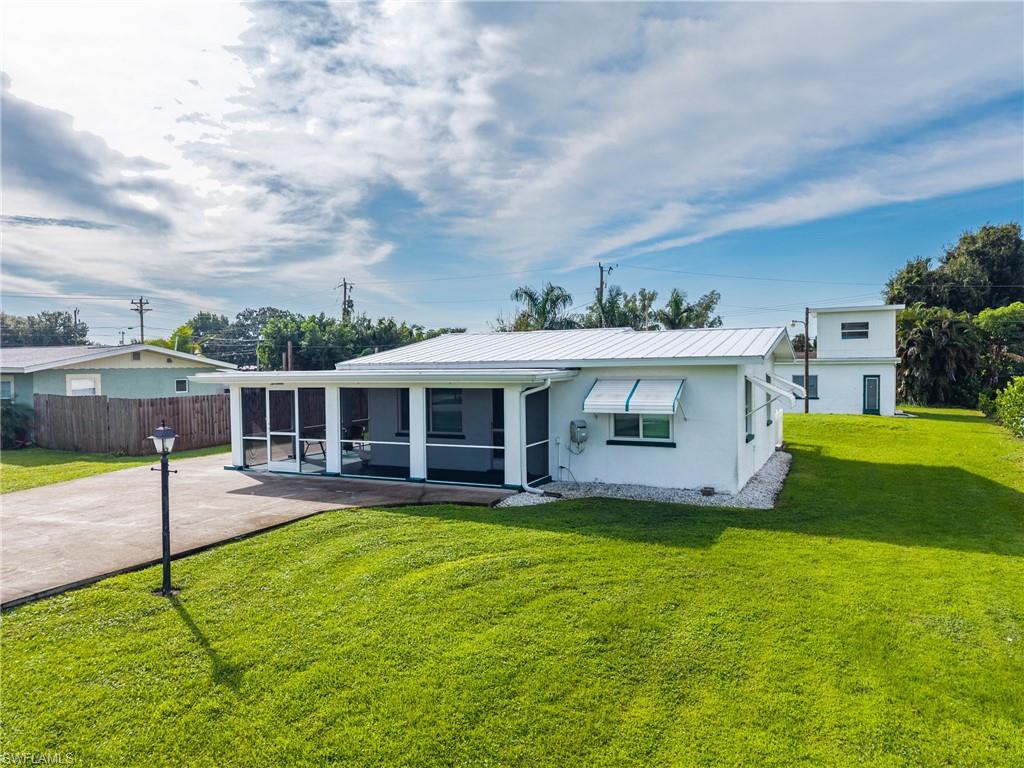CHARMING, TURNKEY AND PACKED WITH UPDATES! Welcome to 17 Victoria Dr, a delightful North Fort Myers home that proves great things really do come in smaller packages! From the moment you arrive, this home has that warm, inviting feel that makes you want to stay. Best of all, it’s being sold TURNKEY—just bring your clothes and start enjoying the Florida lifestyle.
The major improvements are already done, including a NEW A/C in 2026, NEW METAL ROOF in 2024, and HURRICANE IMPACT WINDOWS in 2023, giving the next owner added comfort and peace of mind.
And then there’s the bonus that really sets this property apart—the detached 1-car garage with additional storage and its own NEW ROOF in 2024! Mechanic? Car enthusiast? Woodworker? Hobbyist? Or just dreaming of the ultimate man cave? This is the space you’ve been looking for. A John Deere mower is included, and the property even features an underground dog fence for your four-legged family members.
Whether you’re looking for a full-time home, seasonal Florida escape, or an easy-to-maintain property with a fantastic workshop/garage space, this little charmer delivers WAY more than you’d expect. Furnished, updated and ready to enjoy from day one—just unpack your suitcase and call it HOME!