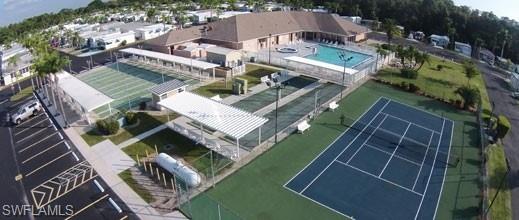 Low HOA fee's! Welcome to easy resort style Florida living in the highly desirable Fountain View RV Resort! This lovely 2-bedroom, 2-bathroom manufactured home offers sweeping lake views and charming curb appeal, featuring clean vinyl siding, decorative accent shutters, and a welcoming front porch perfect for relaxing.

Step inside to a thoughtfully updated interior showcasing elegant, modern color tones paired with attractive tile and low-maintenance wood-like flooring throughout—no carpet in sight! The open layout is bright and inviting, creating a comfortable space to relax or entertain guests. For added convenience, this home includes an indoor washer and dryer that convey with the property.

Whether you're looking for a turnkey, fully furnished escape or a blank canvas to make your own, this property offers complete flexibility: it can be sold furnished or unfurnished.

Don't miss this opportunity to own a gorgeous waterfront retreat with stunning lake views in a vibrant resort community. Schedule your private showing today!