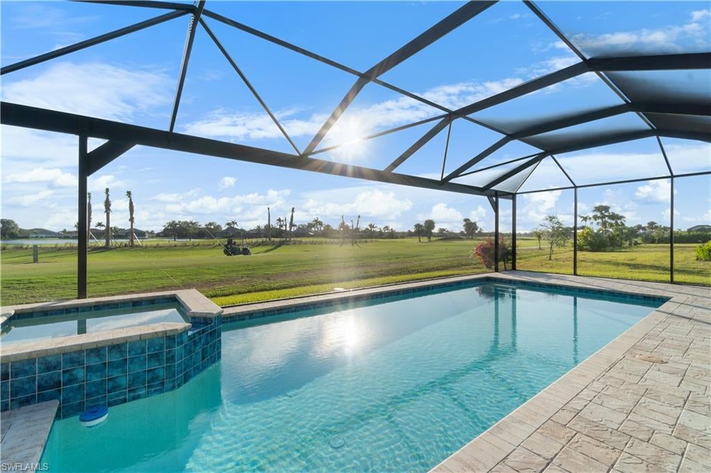 Step into luxury with this exquisite home in the highly sought-after Royal Palm Golf Estates community. Completed in 2022, this spacious residence offers a perfect blend of modern elegance and comfortable living. Featuring 3 bedrooms, a large den (which could serve as a 4th bedroom), and soaring ceilings, this home is designed to impress. The beautifully appointed kitchen is a chef’s dream, with modern finishes and ample space for cooking and entertaining. Tile flooring flows seamlessly throughout the home, creating a clean and cohesive look. The property boasts a 3-car garage, perfect for storing vehicles and recreational equipment. Situated on a large lot directly on the golf course, this home offers unparalleled views and a sense of tranquility. The backyard is a true oasis, with an oversized custom pool and hot tub enclosed by a panoramic screen. Enjoy breathtaking golf course views while relaxing or entertaining in your private retreat.