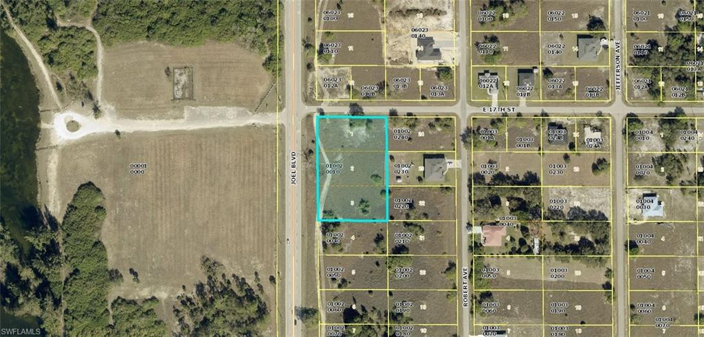 Rare 1.5-Acre Corner Lot on Joel Blvd! Don't miss this exceptional opportunity to own a beautifully positioned 1.5-acre corner parcel in the growing community of Lehigh Acres. Comprised of three contiguous half-acre lots, this property offers outstanding flexibility for those looking to build a custom estate, invest, or hold for future appreciation. The land has been primarily cleared, with a survey and environmental study already completed, helping you take the next steps with confidence. Enjoy ample space for a custom home, detached garage, workshop, RV or boat storage, pool, and more—all while maintaining privacy and room to grow. Conveniently located directly off Joel Blvd, providing easy access to shopping, schools, dining, parks, and major roadways. Whether you're a builder, investor, or future homeowner, this is a unique opportunity to own a large parcel in one of Southwest Florida's fastest-growing areas