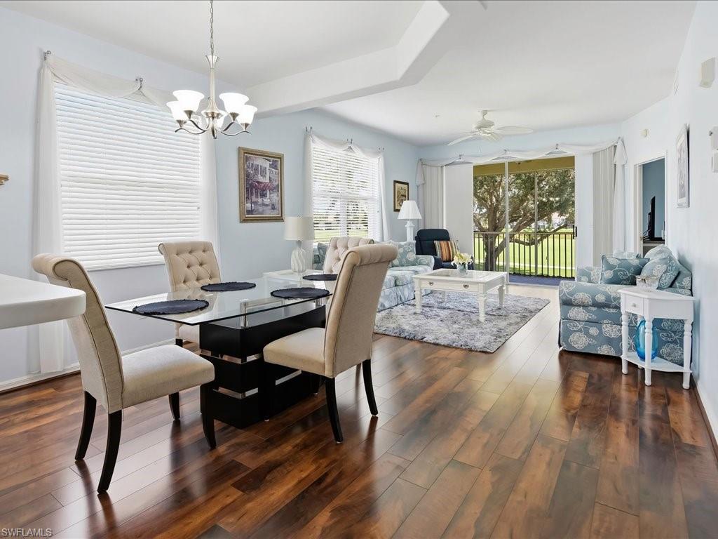 TURNKEY FURNISHED and impeccably maintained, this spacious 2-bedroom, 2-bathroom second-floor condo offers an exceptional blend of comfort, style, and Southwest Florida living in the highly desirable gated Legends Golf & Country Club. Step inside to a bright, polished interior featuring tasteful furnishings, ceiling fans, window shutters, and an open living and dining area that creates a warm and inviting atmosphere. The well-appointed kitchen offers abundant white cabinetry, generous counter space, and a convenient breakfast area. Both bedrooms provide comfortable retreats, while the screened lanai creates a serene outdoor escape overlooking lush landscaping and a scenic golf-course setting. Offered fully turnkey furnished, this residence is truly move-in ready and ideal as a full-time home or seasonal retreat. Legends delivers an impressive resort-style lifestyle with an 18-hole golf course, resort-style pool and spa, tennis, pickleball, bocce, fitness center, clubhouse, dining, and an active social atmosphere. Ideally situated just off Daniels Parkway, the community provides convenient access to I-75, Southwest Florida International Airport, shopping, dining, entertainment, and the Gulf Coast’s renowned beaches. This is a fantastic opportunity to enjoy an elevated Southwest Florida lifestyle in a thoughtfully furnished home within one of Fort Myers’ most sought-after communities.