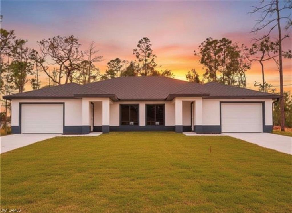 BRAND-NEW 2026 DUPLEX | 6 BEDROOMS | 4 BATHROOMS | TWO GARAGES | NO HOA! An exceptional opportunity to own a beautifully designed duplex in the growing North Lehigh Acres area! Whether you’re an investor looking to expand your real estate portfolio or a homeowner interested in living in one unit while renting the other, this property offers incredible flexibility and income potential.

Each spacious unit features 3 bedrooms, 2 bathrooms, a private 1-car garage, and a thoughtfully designed open-concept floor plan. Enjoy modern kitchens with quartz countertops, stainless steel appliances, ample cabinet space, and stylish finishes throughout. Luxury vinyl flooring, abundant natural light, and functional living spaces create a comfortable, contemporary atmosphere.

Situated on a generous lot with NO HOA, this property offers added freedom and versatility. Conveniently located near shopping, dining, schools, and major roadways.

TWO SEPARATE RESIDENCES. ONE GREAT INVESTMENT OPPORTUNITY! Perfect for rental income, owner occupancy, or multigenerational living. Don’t miss your chance to add this brand-new duplex to your real estate portfolio. Schedule your showing today!