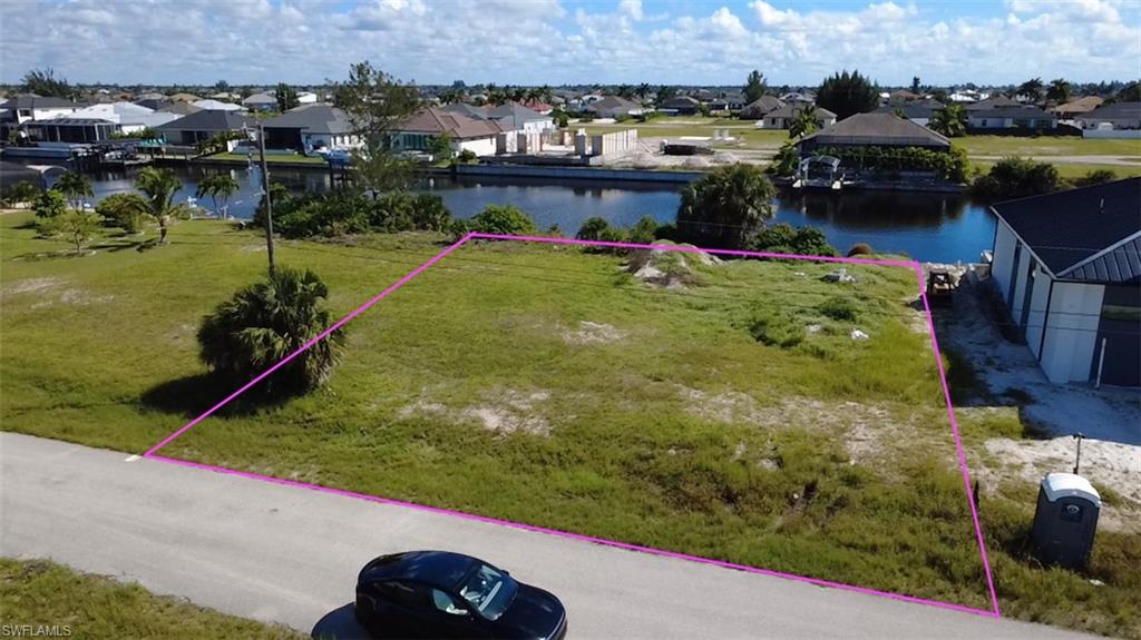 Gulf Access Double Lot – NW Cape Coral

Build your dream waterfront home on this oversized double lot (Lots 12 + 13) on a wide, Gulf-access canal in fast-growing Northwest Cape Coral. The 0.24-acre homesite offers approx. 85 ft of water frontage and an east-facing rear exposure for morning sun over the water. There are no bridges to open water, which makes it ideal for power or sailboats. Zoned single-family residential, it’s close to Burnt Store Rd shopping, dining, marinas and boat ramps. 

The property sits within the City’s planned North 3 Utilities Extension Project area and is currently well and septic. Flood Zone AE. Bring your builder and your boat! Buyer to verify all measurements, canal access, utility availability and assessments, and flood zone and elevation information.