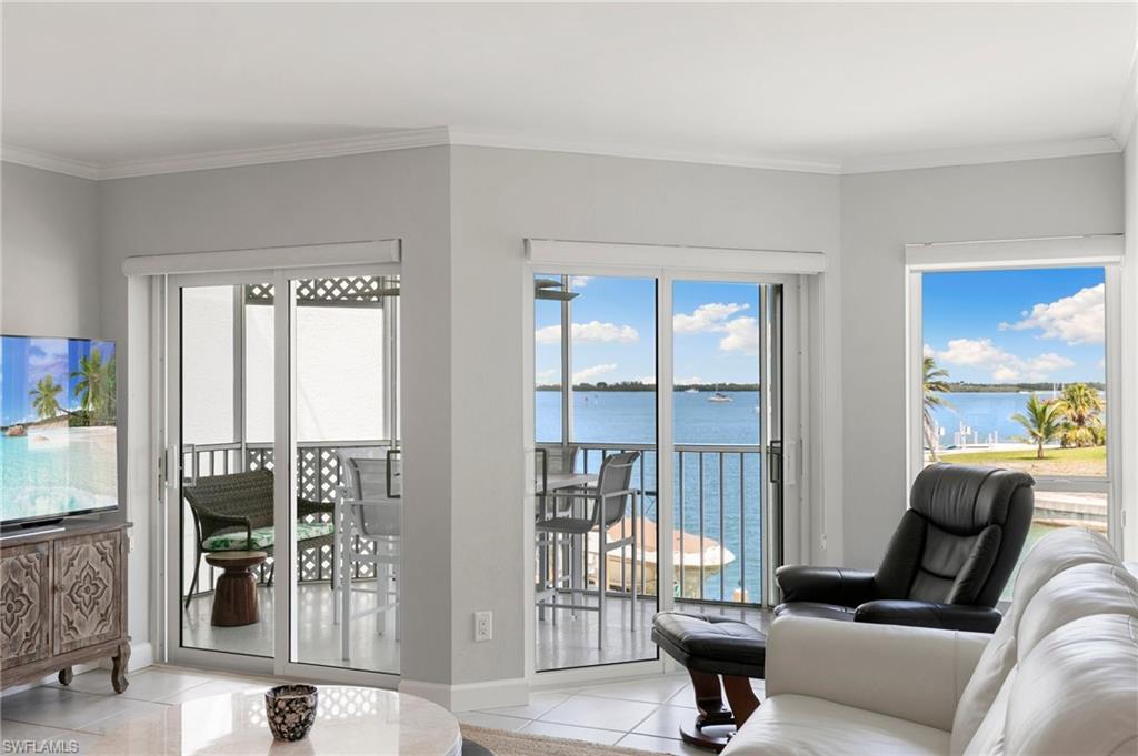 TWO side-by-side deeded boat slips, 30 feet each, offering quick, direct access to the Gulf. A rarity on Marco Island, this is the kind of waterfront opportunity boaters look for.
Experience effortless island living in this stylishly updated 2-bedroom, 2-bath condo with breathtaking wide water views of Factory Bay and the Marco River. Offered turnkey, the home features a bright, open floor plan, tasteful furnishings, and a seamless flow for relaxed living or entertaining.
The versatile second bedroom easily functions as a guest space or home office, complete with a space-saving queen Murphy bed, while the primary suite offers a spacious layout including a walk-in closet. Step out onto your screened lanai and enjoy front-row seats to dolphins playing and boats gliding by--your own private slice of paradise. In unit washer & dryer. New Impact slider doors and windows installed in 2023. Located in the pristine Grand Bay, a pet friendly community, residents enjoy resort-style amenities including a pool, pickleball, kayak storage, and a floating dock for easy launch. Additional conveniences include a covered parking space ideally situated next to the elevator and an easy on/off island location close to dining, shopping, and the charm of Olde Marco.
Move In Ready...A combination of boating convenience, waterfront beauty, and effortless coastal living--this waterfront gem offers everything you need to fully embrace the Marco Island lifestyle.