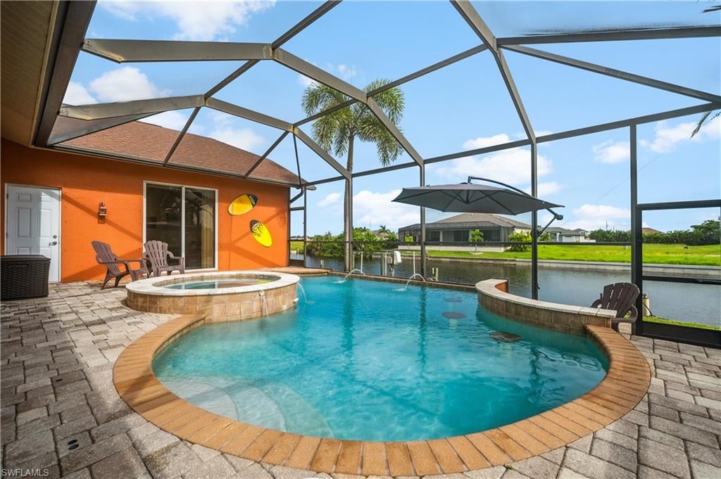 Twenty minutes from your dock to open water. One 9' bridge, then you're out in the Gulf of America. 

Built in 2004, block construction, four bedrooms in a real split plan, 2,288  square feet under air with 80 feet of canal frontage. Dock and 7,000 pound boat lift are ready to go. The pool is free form with a spa and a swim-up bar under a screened lanai, and the garage is oversized, so the trailer, gear, and tools all fit. 

The expensive items are already handled. A/C is new as of August 2026. Pool heater was purchased and installed in October 2024, and the roof is from 2019. Manual shutters are included. 

Inside, vaulted ceilings, two living rooms, a formal dining room plus a breakfast nook, jetted tub, dual sinks, walk-in closets even in the guest bedrooms, tile throughout, double oven. and guest quarters that work as an in-law suite or a home office. 

Tropicana Park is brand new and right around the corner as well as the Seven Islands marina project which is going in minutes from here. No HOA. Furniture is negotiable.