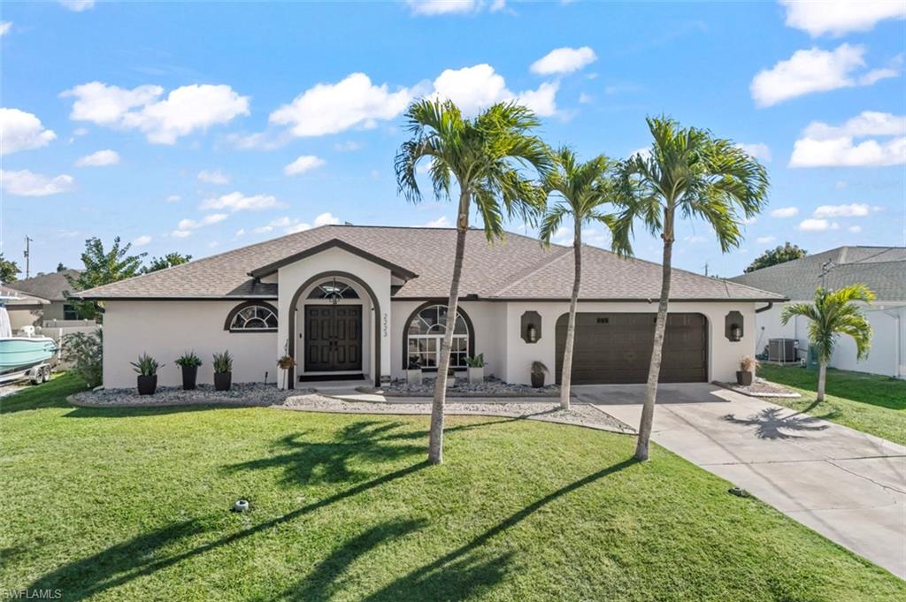 Welcome home to a beautifully maintained and thoughtfully updated pool residence offering comfort, efficiency, and the Florida lifestyle buyers are searching for. Located in a quiet, established neighborhood near shopping, dining, and everyday conveniences, this spacious home has seen significant system upgrades that provide peace of mind for years to come.

From the moment you arrive, the double front entry doors welcome you into a light-filled formal living and dining area, with expansive pocket sliders that open directly to the pool and lanai—creating seamless indoor-outdoor living. Outside, lush tropical landscaping surrounds the pool area, offering privacy and a peaceful retreat ideal for relaxing or entertaining.

The desirable split floor plan provides both functionality and privacy. The primary suite features direct pool access, a generous walk-in closet, and an en-suite bath with dual sinks, a walk-in shower, and a separate water closet. The guest wing includes two additional bedrooms and a convenient pool bath, perfect for family or visitors. ASSUMABLE MORTGAGE

At the heart of the home, the open kitchen and family room create a warm gathering space. The kitchen offers an eat-in dining area and a casual breakfast bar—perfect for morning coffee or evening conversations—while the family room provides comfortable space to unwind with views of the pool and lanai.

Recent improvements include:

New roof (2020)

New A/C system (2022)

New water heater (2025)

Pool resurfaced (2022)

Chlorine pool with electric heat and new pool heater (2021)

Reclaimed-water irrigation system, eliminating well odor concerns

New sprinkler system control box in garage and new sprinkler timer (2021)

The pool features a child safety fence, and the irrigation system is currently operational, with minor sprinkler head adjustments in progress.

This home has been lovingly cared for and updated where it matters most—offering buyers a solid, move-in-ready property with major systems already addressed. Whether entertaining poolside, enjoying quiet evenings at home, or simply appreciating the convenience of the location, this home is sure to please.