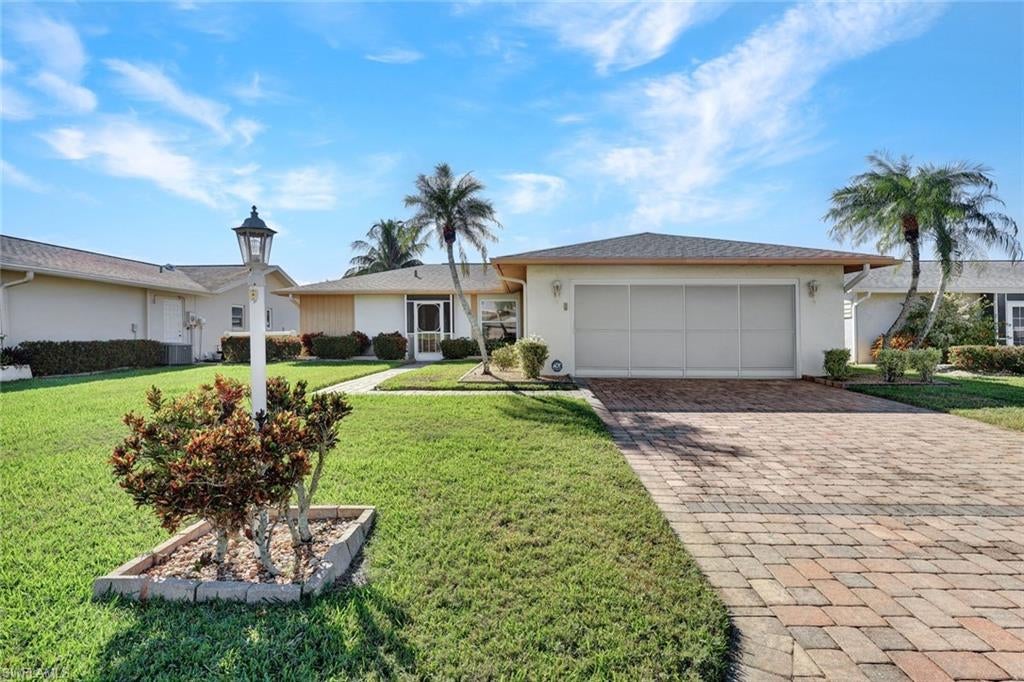 Priced to Sell! Nestled in the heart of Fort Myers, this enchanting abode offers a harmonious blend of comfort and convenience, perfect for those seeking a serene yet connected lifestyle. As you step through the threshold, you'll immediately sense the impeccable care and cleanliness that defines this well-maintained sanctuary. A testament to thoughtful design, the home boasts newer appliances, ensuring your culinary adventures are nothing short of exceptional. The allure continues outdoors, where a fenced backyard provides a private oasis for relaxation and play. Your weekends can be spent basking in the sun by the community pool, delving into stories at the library, or engaging with neighbors at the bustling clubhouse. With low HOA fees, these amenities are yours to enjoy without stretching your budget. The screened garage adds a layer of versatility, offering a unique space for projects or leisure. Perfectly positioned, this home is a stone’s throw away from local beaches and shopping destinations, with the added benefit of being within walking distance to the local grade school, making school runs a breeze. Embrace a life of ease where every detail is thoughtfully curated for your ultimate comfort and enjoyment in this charming Fort Myers retreat.