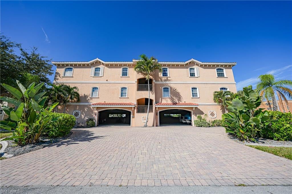 Exceptional Waterfront Living in Punta Gorda. Discover the best of Florida living in this spacious first floor, 3-bedroom, 2-bath condominium with 1,872 sf of beautifully appointed space. Enjoy quick powerboat access to the Peace River and Gulf of America right from your assigned boat dock with a lift—perfect for boating enthusiasts and water lovers alike. With two covered parking spaces and a private stairwell leading to the pool/spa and dock area, convenience is built into every corner of this property. Located in a serene, boutique waterfront community with only four units this home offers a rare combination of tranquility, luxury, and prime boating access. Inside, the open floor plan is designed for comfort and modern living. The generous kitchen boasts a breakfast dinette, walk-in pantry, and ample counter space, while the spacious great room features breathtaking views of the water. The extended lanai, complete with an outdoor cooktop, offers the perfect setting for entertaining or relaxing in the beautiful Florida weather. The oversized primary bedroom is a true retreat, offering a large walk-in closet and a luxurious private bath with a walk-in shower. A thoughtful split-bedroom design ensures privacy for family members or guests, while the hall bath is generously sized. Crown molding throughout the main living areas and a combination of tile and carpet flooring add to the elegant feel of the home. Located just minutes from the shops and restaurants of Fisherman’s Village and downtown Punta Gorda, you’ll have endless opportunities to enjoy fine dining, entertainment, and waterfront strolls. This property offers the perfect balance of peaceful waterfront living with close access to the vibrant cultural and social scene of Punta Gorda. Don’t miss out on the chance to own a piece of paradise—schedule your private showing today!