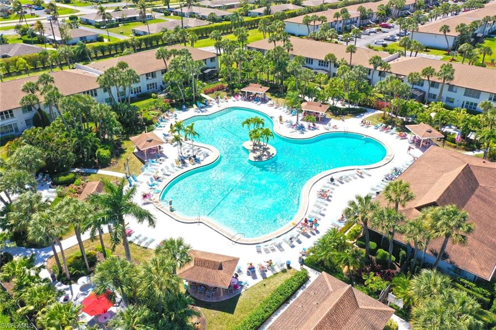 !!!You cannot get a better location and square footage for the money this close to town in any other community!!! PET-FRIENDLY -- spacious FIRST floor 2BR/2BA garden apartment is only a few minutes to downtown Naples and all the wonderful activities, shopping, restaurants, entertainment and of course, the world-renowned beaches! The updated residence is LIGHT & BRIGHT and features 1200+SF including a front screened-in lanai and a rear open patio. The primary suite has a private full bath plus a large walk-in closet. You are a short walk to the Winterpark neighborhood amenities including the HUGE heated, resort-style community pool which is the 3rd largest in the state of Florida! The pool deck is dotted with palm trees and an abundance of deck chairs! There are also bike and jogging trails, park-like landscaping, tennis and pickle ball courts, bocce and the fabulous clubhouse has a library and tons of activities! You can walk to Kings Lake Square for grocery shopping and some of the areas best and well-priced restaurants! This is AN IDEAL year-round or seasonal residence! *Per the community's financials, the HOA provides flood insurance and is included in the quarterly fee. This policy satisfies the required coverage for a mortgage. *
