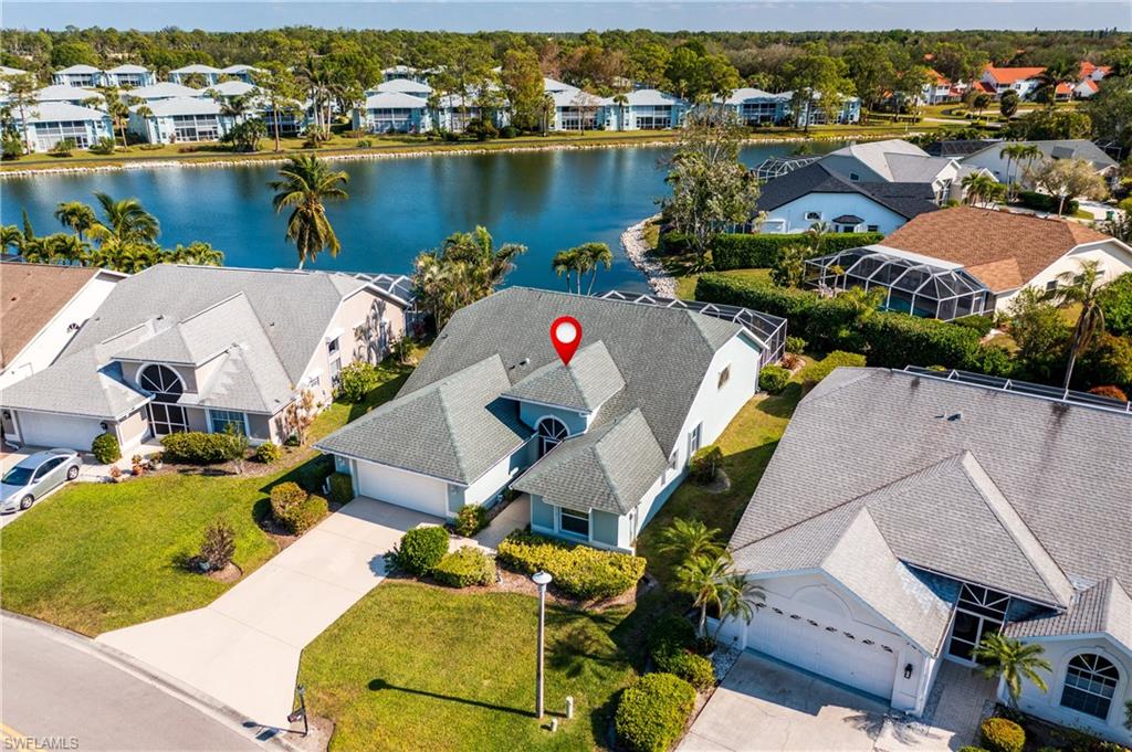 THIS IS THE PEACEFUL CUL-DE-SAC LAKEFRONT HOME YOU HAVE BEEN WAITING FOR !! Enjoy this light filled spacious 3 bed+den, 2 bath home which sits on a beautiful, private lake view. Don't forget your custom designed solar heated pool w a large screened lanai perfect for entertaining. No carpet here - flooring includes wood floors throughout w 18"x18"tile in kitchen and bathrooms.Updates include kitchen appliances, solar panels to heat pool, new pool pump, replaced windows, upgraded hurricane garage door, quartz countertops and added backsplash in the kitchen, exterior and interior painting of home, newer A/C unit, water heater, lanai screen, well for irrigation ( save money on watering lawn year round and filling up your pool )and a new roof all within the last six years.Berkshire Lakes is a very active community including tennis, pickleball, clubhouse and walking paths around the lakes. Low fees of $640.00 yearly. Conveniently located near grocery, restaurants, downtown, world class beaches, shopping and more. One of the larger homes in the community and NOT IN A FLOOD ZONE.