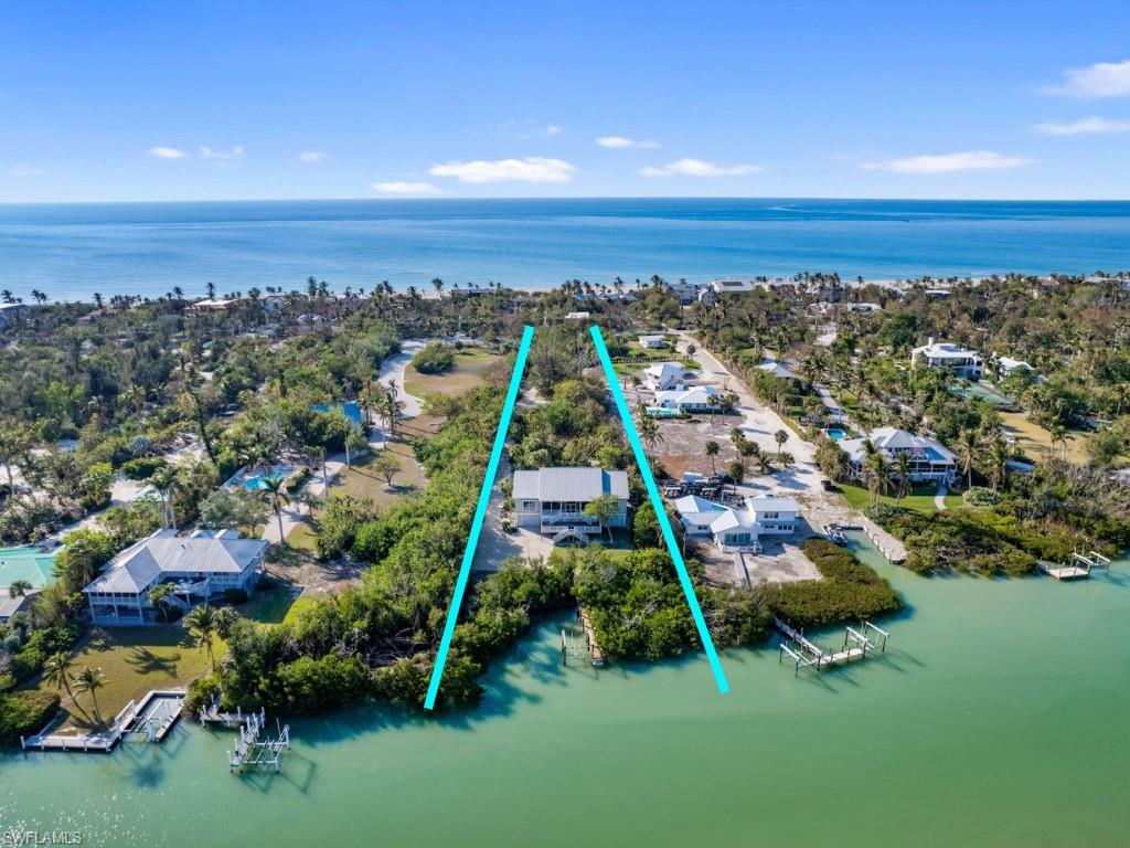 Nestled along the most coveted stretch of Captiva Island’s Gold Coast, This charming Old Florida-style main house boasts a private pool area and expansive deck space, creating a perfect retreat. Inside, high vaulted ceilings and an open kitchen enhance the spacious feel. Situated in the Estate Zone District, this property offers deeded beach access just steps away. Perfectly positioned in the heart of this prestigious area, the dune-wide beachfront setting offers breathtaking views and unparalleled serenity.Whether you choose to enjoy it as is or expand with additional square footage or a separate living structure, the possibilities for creating a private family compound are endless. A cherished part of a family estate for over 40 years, this property is surrounded by lush tropical landscaping, enhancing its secluded and tranquil ambiance. For those seeking the ultimate private retreat, two adjacent properties—16530 Captiva Drive and 16548 Captiva Drive—are also available, presenting a rare opportunity to create a 300-foot beachfront and 100-foot bayfront compound spanning over 5.25 acres. Whether enjoyed as a standalone sanctuary or as part of a grand waterfront estate, this is truly a once-in-a-lifetime chance to own an iconic piece of Captiva Island.