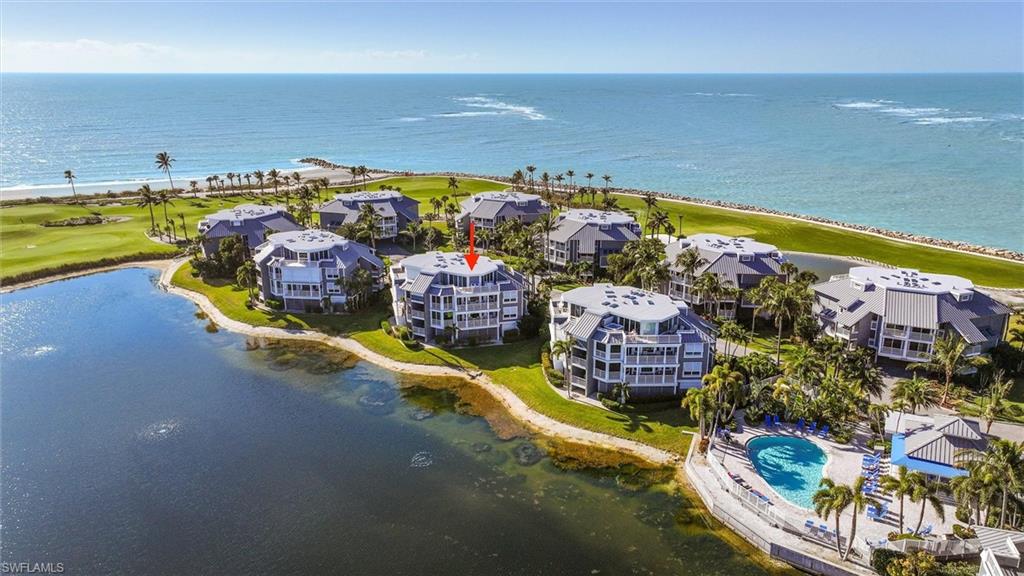 Seller Incentive: $50,000 Credit at Closing — Purchaser to receive a $50,000 credit at closing, providing flexibility to personalize, update, furnish, or enhance the residence to suit their preferences.  A rare opportunity to acquire this exceptional Lands' End residence with additional flexibility to customize finishes, make improvements, or create your ideal Captiva retreat. This exceptional two-story residence overlooks a tranquil lake, golf course, and the shimmering waters of Pine Island Sound and the Gulf of Mexico. Enjoy breathtaking sunrises and sweeping daytime views from this remarkable three-bedroom, three-bath condominium, located in the prestigious Lands’ End Villas at the northernmost point of Captiva Island. A true highlight of the home, the penthouse primary suite offers awe-inspiring 180-degree panoramic vistas—an ideal canvas to create your own serene private retreat. The expansive living area is thoughtfully designed for comfort, enjoyment, and entertaining, featuring both a glass-enclosed lanai and an open-air lanai, along with a private sundeck off the primary suite that captures some of the most spectacular sunrise views on Captiva. Numerous upgrades enhance the residence, including an upstairs laundry room, an expanded primary walk-in closet and large owner’s closet, a beautifully appointed primary bath, and a relaxing jetted tub. Additional features include a private elevator, two dining areas, a breakfast bar, and elegant quartz and granite countertops throughout. Offered furnished with exceptions, this unique coastal residence is ready to welcome you and your family to create treasured memories while enjoying the exceptional amenities and unparalleled views that Lands’ End Village offers.