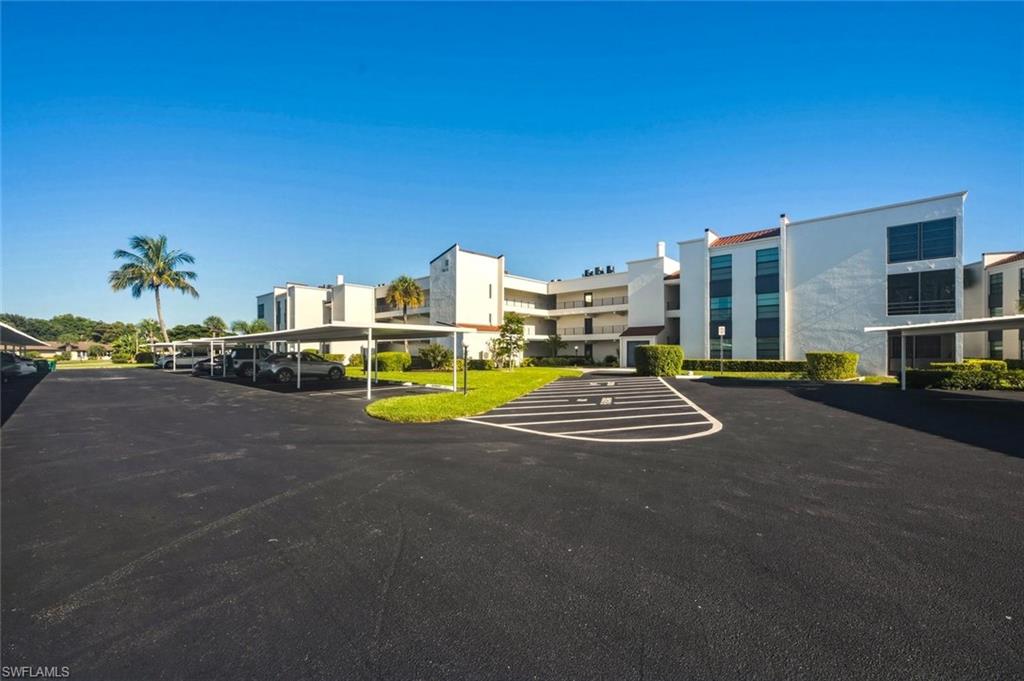 This is a Potential Short Sale; don't miss the opportunity to purchase this 1-bedroom, 1-bathroom second-floor condo in The Lakewood community! The enclosed lanai overlooks tropical greenery, swaying palm trees, and the community pool area, creating a peaceful setting to relax and unwind. This unit features tile flooring throughout. The kitchen features granite countertops, a stainless-steel refrigerator and dishwasher, and wood cabinetry. The bathroom offers wood cabinetry, a tiled shower with a glass door, and an updated commode, sink, and faucet. A convenient covered carport adds to the appeal. Ideally located just a short drive from beautiful downtown Old Naples, you'll enjoy renowned dining, boutique shopping, art galleries, and pristine white-sand beaches. Whether you're searching for a seasonal Florida retreat or a year-round place to call home, this is an opportunity worth exploring. Can you recognize an opportunity when it comes? Call today!