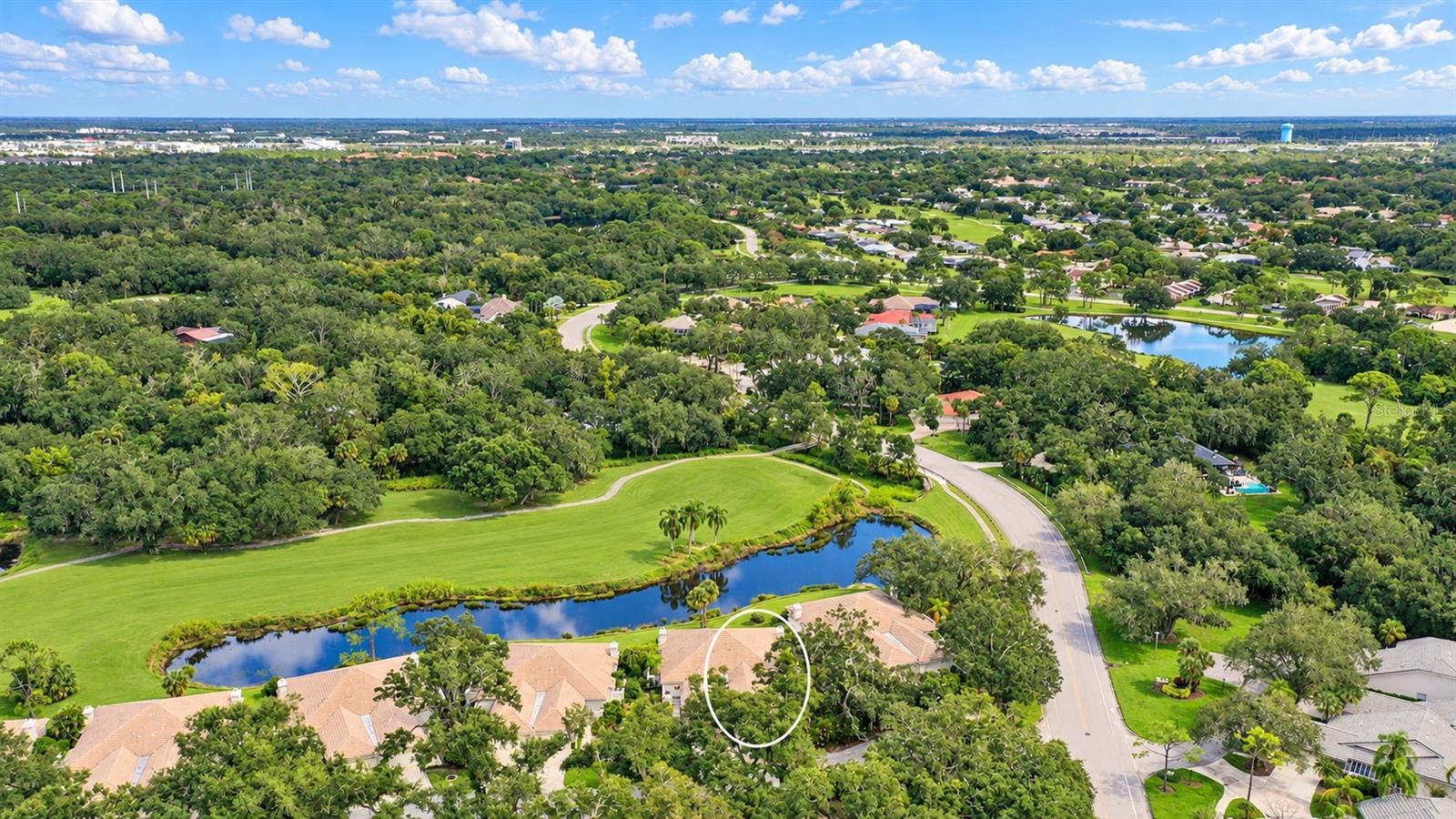 BEAUTIFULLY UPDATED VILLA WITH SPECTACULAR LAKE, GOLF AND PRESERVE VIEWS! Maintenance-free living at its finest in desirable Oakley Greene, nestled in The Meadows, a park-like oasis in a phenomenal location!
A picturesque canopied street, paver driveway and charming courtyard welcome you home. Inside, a thoughtfully updated great-room plan features abundant natural light, spacious rooms, elegant large-format rectified Enza White tile flooring and plantation shutters. Panoramic windows frame breathtaking lake, golf and preserve views from nearly every room.
The beautifully updated kitchen opens to the great room through a graceful archway and features rich espresso solid-wood, soft-close cabinetry with convenient pull-outs, gleaming Bella quartz countertops, stainless steel appliances and a deep undermount SilGranit sink. A patio just outside makes grilling a breeze.
The spacious primary suite offers a walk-in closet and an updated bath with dual vanities and a gorgeous Sierra Leaf White tile-surround shower.
You'll love the glass-enclosed lanai, your front-row seat to tranquil water views and a daily parade of birds. Perfect for morning coffee, relaxing with a book or entertaining friends. Just steps from the community pool, this delightful villa offers the perfect blend of stylish comfort, natural beauty and carefree Florida living.
All just a short drive to all the fun The Meadows has to offer and five minutes to the UTC Mall, a world-class destination for shopping, dining, and entertainment.
Set on 1,600 lush acres just 15 minutes from Downtown Sarasota, The Meadows combines resort living with the beauty of untouched nature. Enjoy 14 miles of scenic trails, an active social calendar, new fitness center, Junior Olympic pool, 10 pickleball courts, two 18-hole golf courses, and 15 Har-Tru tennis courts. Ideally located near award-winning beaches, cultural attractions, Nathan Benderson Park, Mote SEA Aquarium, Whole Foods, Trader Joe’s, and the upcoming Legacy Bike Trail and Sarasota Orchestra. A fabulous Florida lifestyle awaits.
Features: 2019 A/C system, 2018 A/C ducts, 2015 garage door, 2004 tile roof (Condo responsibility), above floodplain in zone X.