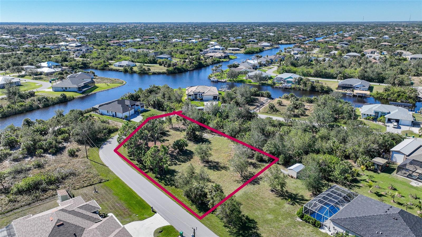 Seize the opportunity to BUILD or INVEST in this DOUBLE LOT on OVER HALF AN ACRE with ZERO WORRIES of ANYONE BUILDING BEHIND YOU!  That's right!  The property behind these 2 beautiful lots is owned by Charlotte County and is designated specifically for parks and open spaces.... so no concern of any construction to invade your privacy!  These parcels (preferred to be sold together) are situated in the WATERFRONT COMMUNITY of South Gulf Cove, recognized for it's 55 miles of CANALS and wildlife bird sanctuary.  Main roads feature multi-use wider sidewalks for your comfort and safety and access to the COMMUNITY BOAT RAMP, or you can select one of the many marinas and public boat launces nearby allowing you to venture directly into the open waters of Charlotte Harbor or sail out to the Gulf and beyond! Fresh seafood including tarpon, snook and redfish could be your catch of the day! The SUGAR-SAND BEACHES of Boca Grande and Manasota Key are just a short distance away for those looking to bask in the sun and surf.  There are ample opportunities for golfing, shopping, live entertainment, farmer's markets and various cultural events to enjoy!  This area boasts a charming small town atmosphere yet larger cities like Sarasota or Fort Myers are only about an hour drive in either direction.  Regional airports are within easy reach!  The building boom is still hot - and we have a list of mortgage brokers who can FINANCE this property with a conventional loan....ask me for details!