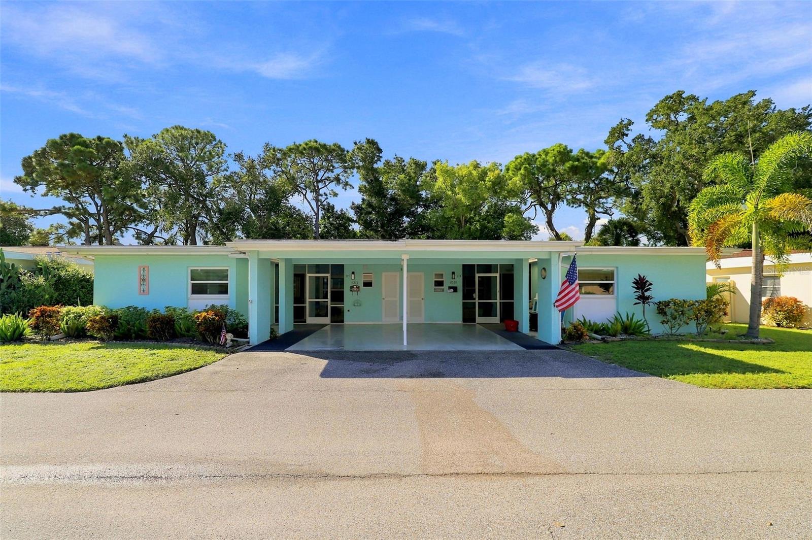 Virtually Staged. Spacious 2 bedroom 2 bath villa close to Gulf Gate and 10 minutes to Siesta Key. Updates include the  kitchen and bathrooms, a newer roof, impact resistant windows and sliders, and motorized aluminum roll-down shutters on the back lanai. The home also features updated plumbing throughout. The kitchen has oak cabinets and granite counters, and the bathrooms are stylish with beautiful cabinets, counters, and ceramic tile flooring. Crown molding and custom shutters add a polished touch. Natural light pours in through numerous windows and three sun tunnels, creating a bright and airy feel all around. Outdoor living is easy with two lanais - one located off the kitchen and another overlooking the backyard. This friendly 55+ community features a clubhouse for social gatherings and activities and a very large pool. The condo fee includes water, cable, internet, trash, and mowing. This home has everything you need for peace of mind, whether you choose to live here year-round or seasonally. Ideal location with grocery stores, restaurants, and shopping minutes from home. Convenient access to I-75 makes commuting and travel easy.