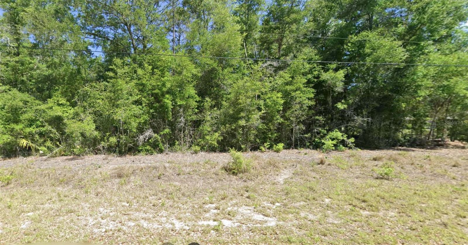 Explore the possibilities with this 0.24-acre vacant residential lot in Rainbow Lakes Estates in Dunnellon, Florida. Located on SW Robin Drive, the property offers approximately 70 feet of frontage and 150 feet of depth, with 10,454 square feet of land. Zoned R-1 for single-family residential use, this parcel presents an opportunity to plan your future home in Marion County. Whether you are considering building or purchasing land for future use, add this property to your list. Buyer to verify dimensions, zoning, permitted uses, utility availability, and building requirements with the appropriate county authorities.