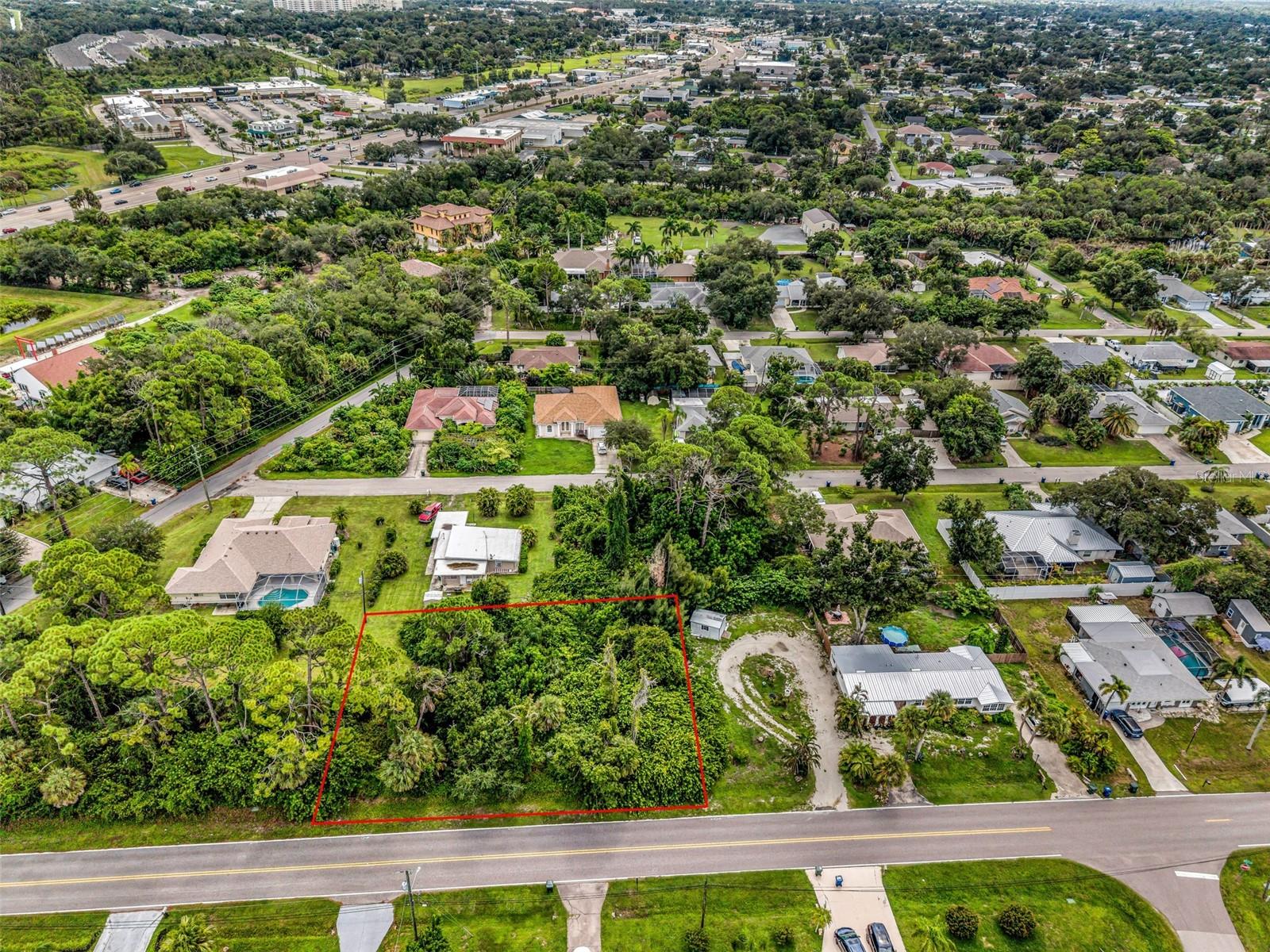 Oversize lot opportunity in South Venice. Fantastic location that is just 2 miles to Shamrock Park and access to biking and walking paths next to the Intracoastal Waterway and just 4 miles to the beach! This is the perfect spot to build your home where you don't have HOA fees or CDD fees. Most of the entire lot is in an X Flood Zone so any construction should not require flood insurance with most lenders. Residents that own in South Venice enjoy the exclusive option to join the South Venice Beach Ferry for a low $200 annual fee, providing access to exclusive amenities including ferry service to a private beach on Manasota Key, a private boat launch, and storage for kayaks, canoes, and paddleboards. With NO CDD fees, NO deed restrictions, and NO HOA, this property offers the freedom to fully embrace the Florida lifestyle—whether boating, fishing, golfing, or simply enjoying your own private paradise.