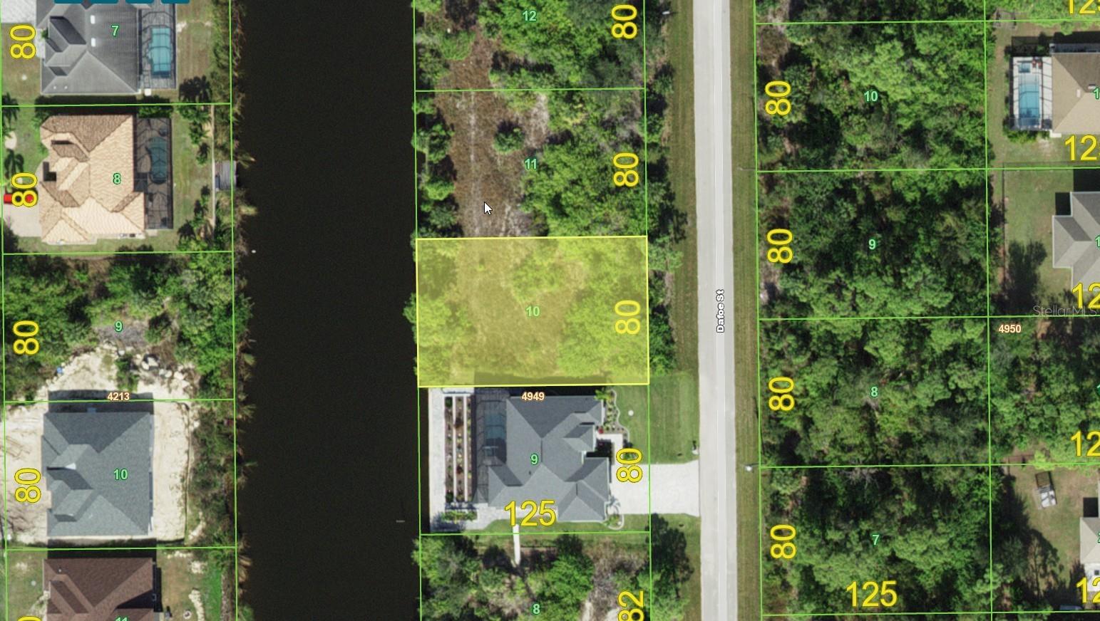 Power boat location with two bridges to Charlotte Harbor     Lot has concrete seawall