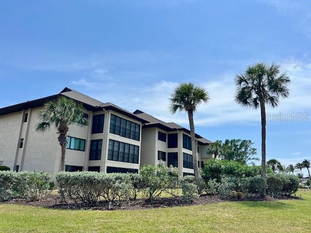 Popular COMMODORE CLUB in Desirable BURNT STORE MARINA....Spacious Condo with lots of Updates...Brand NEW LG Stainless Appliances ....Gorgeous GRANITE Countertops with Breakfast Bar....Hurricane Glass Protection...SPACIOUS screened lanai with distant views of Marina South Basin...TWO LANAIS both front and back....Open Floor Plan.....Formal Dining area....Primary Suite boasts NEW King Mattress & Springs, Bedspread Ensemble, Curtains, and Linens. NEW TV in Guest Bedroom...End Unit with with extra light....your COVERED Parking Spot Right Below....Elevator....COMMODORE CLUB is a friendly and Activity oriented gathering of 8 buildings with lots of separation....Lovely HEATED POOL Area with Activity Room/Kitchen for friend-making SOCIAL EVENTS.....Short walk to FITNESS, RACQUET (Pickleball & Tennis), POOL CLUB.....2 WATERFRONT RESTAURANTS - Live Entertainment....27 hole GOLF Course, Driving Range, Pro-shop and Linkside Café...Golf Cart Rentals....Boat Rentals....Freedom Boat Club or Bring your Boat and Rent one of the 525 Wet Slips....TWO Basins with Gorgeous Boats Bobbing in the glistening waters ..Request FAQ's Page with Detailed Condo Improvements...(One Time $2500 Capital Contribution paid by Buyer at Closing)