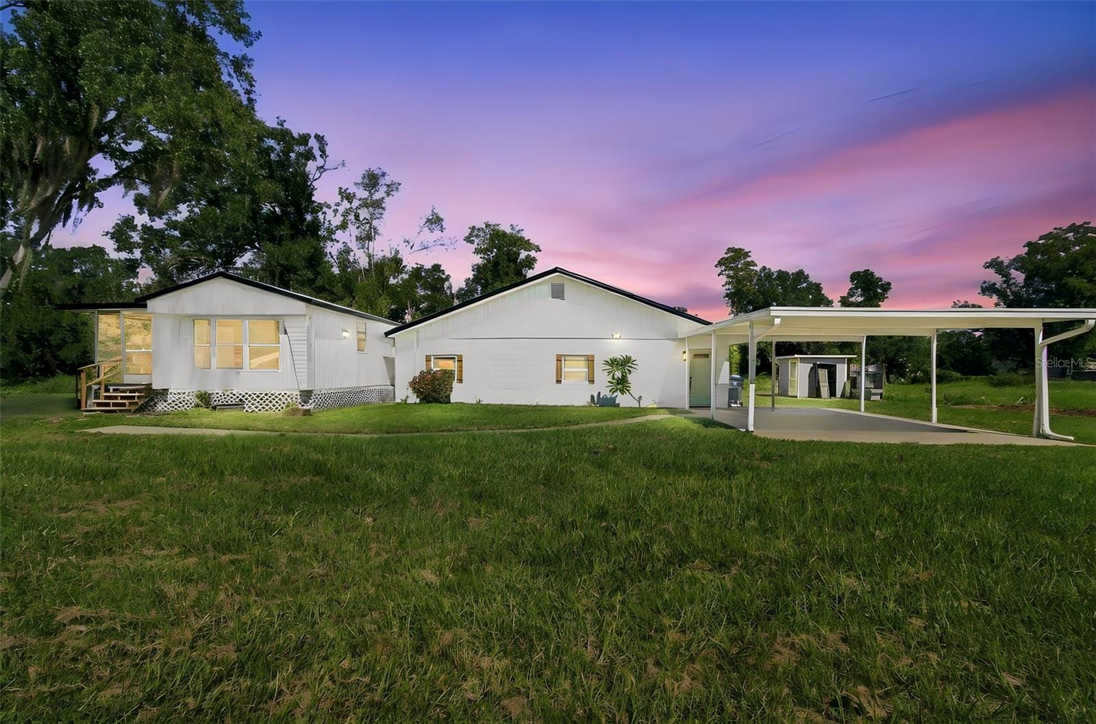 Updated 5 -Bedrooms, 4 1/2 bathrooms and a POOL Home with Multifamily Potential! This block home features a NEW 2026 HVAC!  When you enter, you are welcomed by tons of natural light.This property features an open floor plan with beautiful wood cabinets a center island with quartz countertops all with soft close hardware, stainless-steel appliances, and pendant lights. Fresh interior and exterior paint. In addiction, the manufactured home has 2 bedrooms and 2 baths  provide plenty of space for everyone to spread out.  The home was repiped with PVC/CPVC approximately 2 years ago. The manufactured home has a package unit AC system that is about 3 years old. This property is on well and septic so no need to worry about water bills! The water filtration system is about 3 years old and works great. Amazing location! The airport is a 15 minute drive. Costco, Sprouts, Aldi, Starbucks are all just a mile to the south and everything Citrus Park Plaza has to offer. Don’t miss your chance to make this home yours today!