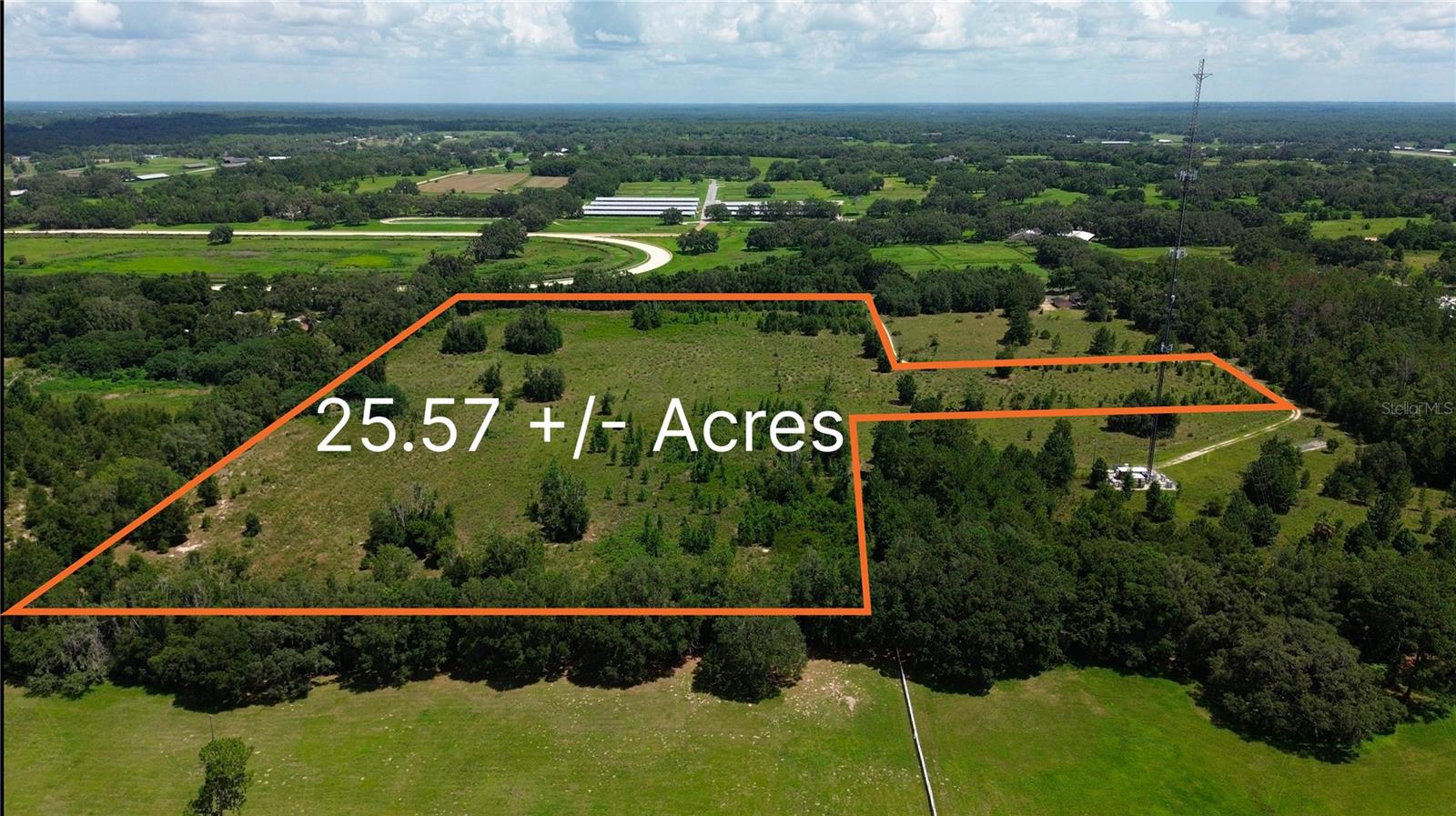 Twenty-five and a half acres, just 10 minutes (7.8 Miles) from the World Equestrian Center, positioned on the south side of Highway 40 in the heart of Marion County's horse country. The property is currently overgrown pasture with mature trees scattered about. The center of the tract sits higher than the edges, providing natural drainage. This is an excellent location for an equestrian estate, training/breeding operation, large-acreage single-family home site, or land banking. 
The Roberts family, ownership group behind the World Equestrian Center and Golden Ocala, acquired the adjacent Classic Mile Park in 2024 for $26.9 million.