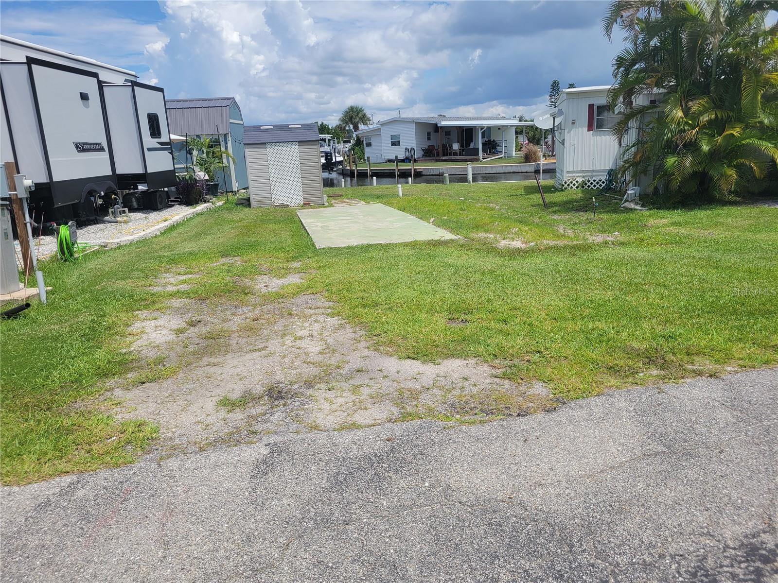 Vacant Canal Lot 138 Bayou Dr, Venice, FL

Build your own place on the water. The previous home has been removed, leaving a clean 2,278 sq ft canal-front lot with water, sewer, and electric already run to the site.

The seawall has been fully replaced, and the dock has cleats and anchor points ready for your boat. You're just around the bend from the Intracoastal Waterway, about 5 minutes to open water and the Gulf.

A storage shed and a paved pad are already in place. Bring your manufactured home, or your RV and get started.