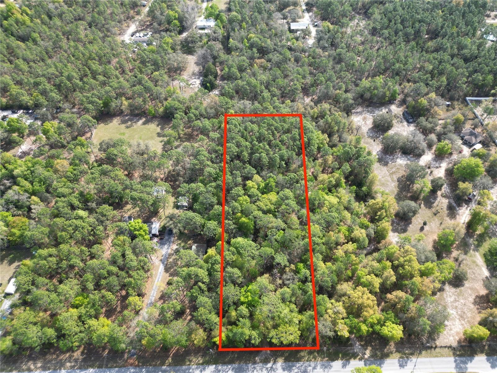 Discover the endless possibilities awaiting you with this prime vacant land offering in Dunnellon, Florida. Situated on a tranquil 2.34-acre parcel, this property presents an incredible opportunity to create your ideal escape. Spread out and enjoy the freedom of 2.34 acres of pristine land, offering ample space for your vision to unfold. Whether you dream of building your dream home, cultivating a thriving garden, or establishing a private retreat, this property provides the canvas for your aspirations. Enjoy the best of both worlds with this conveniently located property, offering peace and privacy without sacrificing accessibility. Explore the nearby amenities of Dunnellon, including shopping, dining, recreational activities, and more. Don't miss out on this exceptional opportunity to own a piece of paradise in Dunnellon, Florida. Whether you're seeking a secluded retreat, a blank canvas for development, or an investment opportunity, this vacant land offers the perfect foundation for your dreams. Contact me today to learn more and seize this chance to make your vision a reality. Bonus Opportunity - Looking to expand your landholding? The lot directly behind this property is also available for sale, with the potential to own nearly 5 acres in total, this presents a rare chance to secure a sizable estate in the heart of Dunnellon, Florida.
