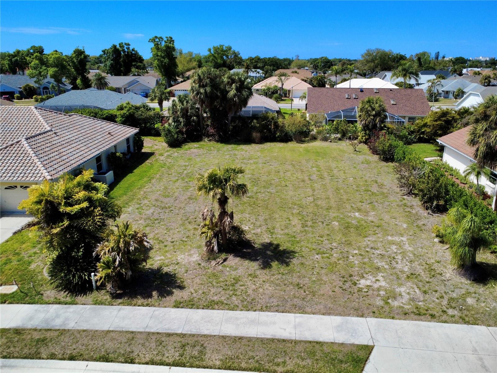 RARE opportunity to build your dream home in the established community of Park Estates, right in the heart of Venice! Located within the Lake of the Woods community, Park Estates is its own private enclave with low HOA fees and no CDD fees! This almost 1 quarter-acre lot offers generous space, excellent separation from neighbors, and plenty of flexibility for you to choose your own custom home builder. A beautifully maintained community park runs through the center of this quiet, charming neighborhood. Perfectly situated between Historic Downtown Venice and Wellen Park, you’ll enjoy quick access to Gulf Coast beaches, shopping, dining, and everything Venice has to offer. Don't miss your chance to own this ONE and ONLY vacant lot left in the Lake of the Woods community. New home must be minimum of 2000 square feet living space and have concrete tile roof. Call and schedule your showing today!