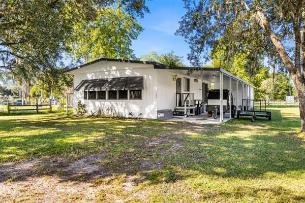 Plenty of room to roam on this 1 acre lot with room for RV, Boat, Tractor or Horse! NO HOA! Extra storage in 40' self contained off grid container with solar power!   Totally upgraded and remodeled!  Effective year built 2020! Convenient to beaches, airports, shopping, movies, restaurants and 408 Exways!